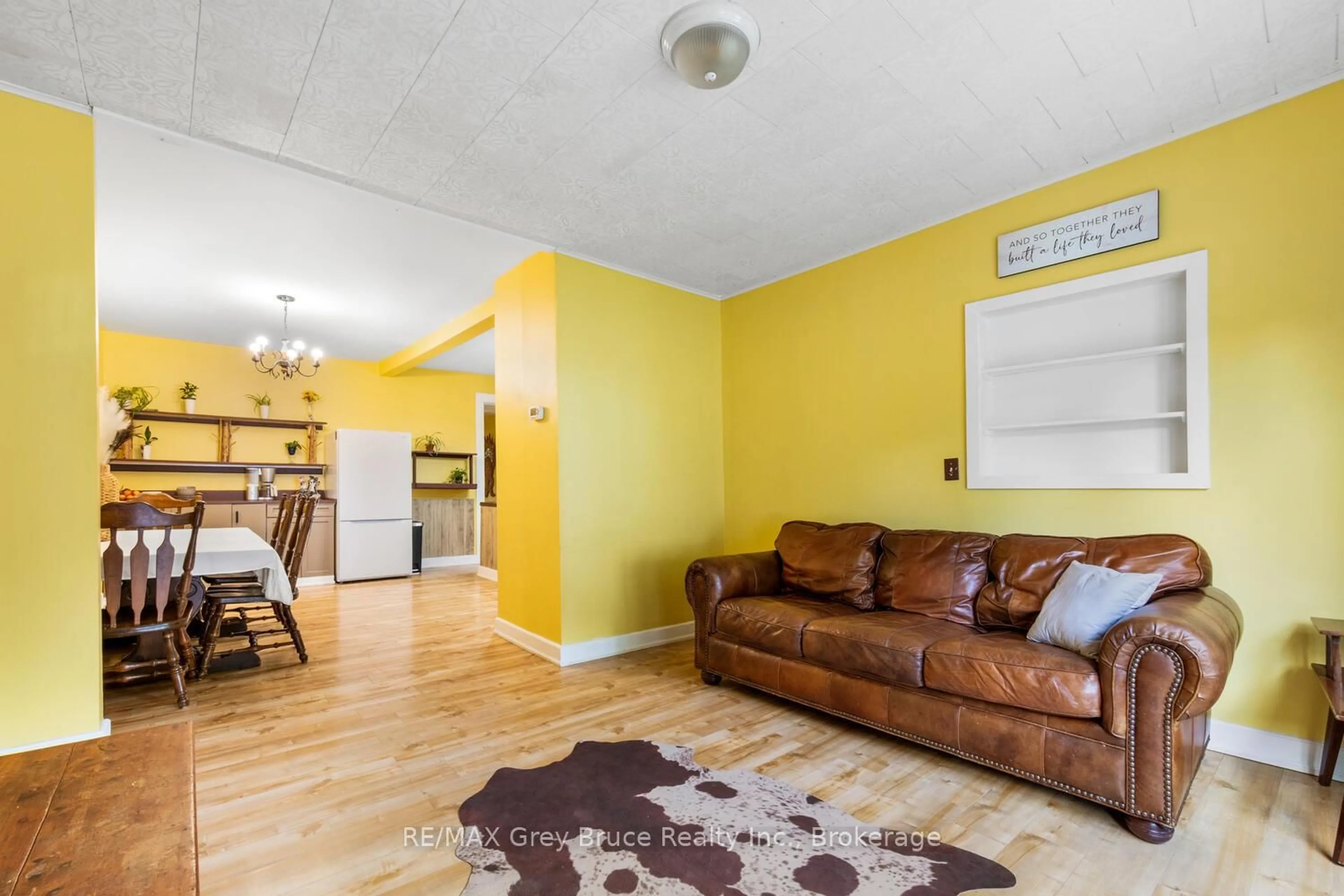 Living room with furniture, wood/laminate floor for 243 Queen St, South Bruce Peninsula Ontario N0H 1P0