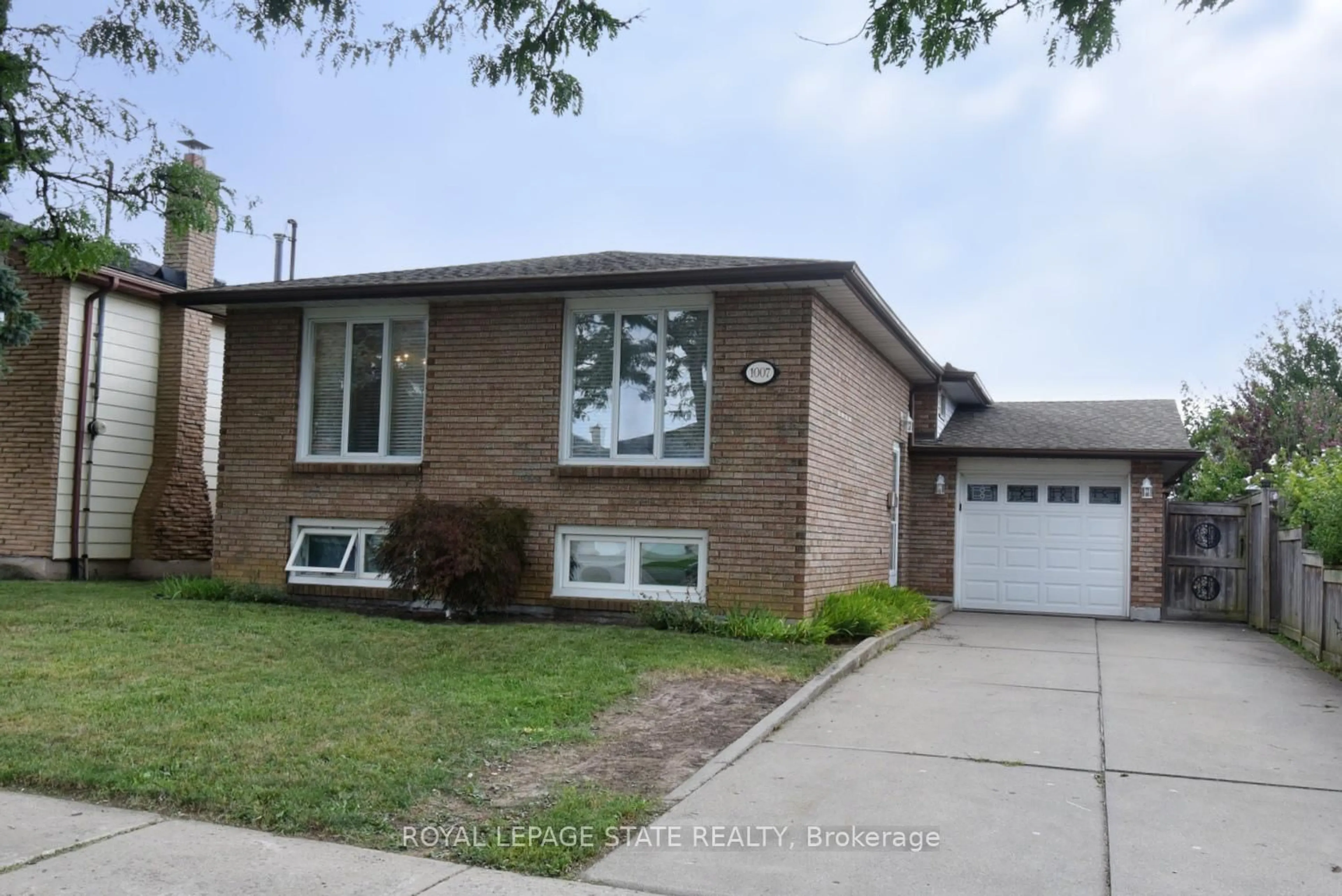 Home with brick exterior material, street for 1007 Upper Sherman Ave #AV, Hamilton Ontario L8V 3N6