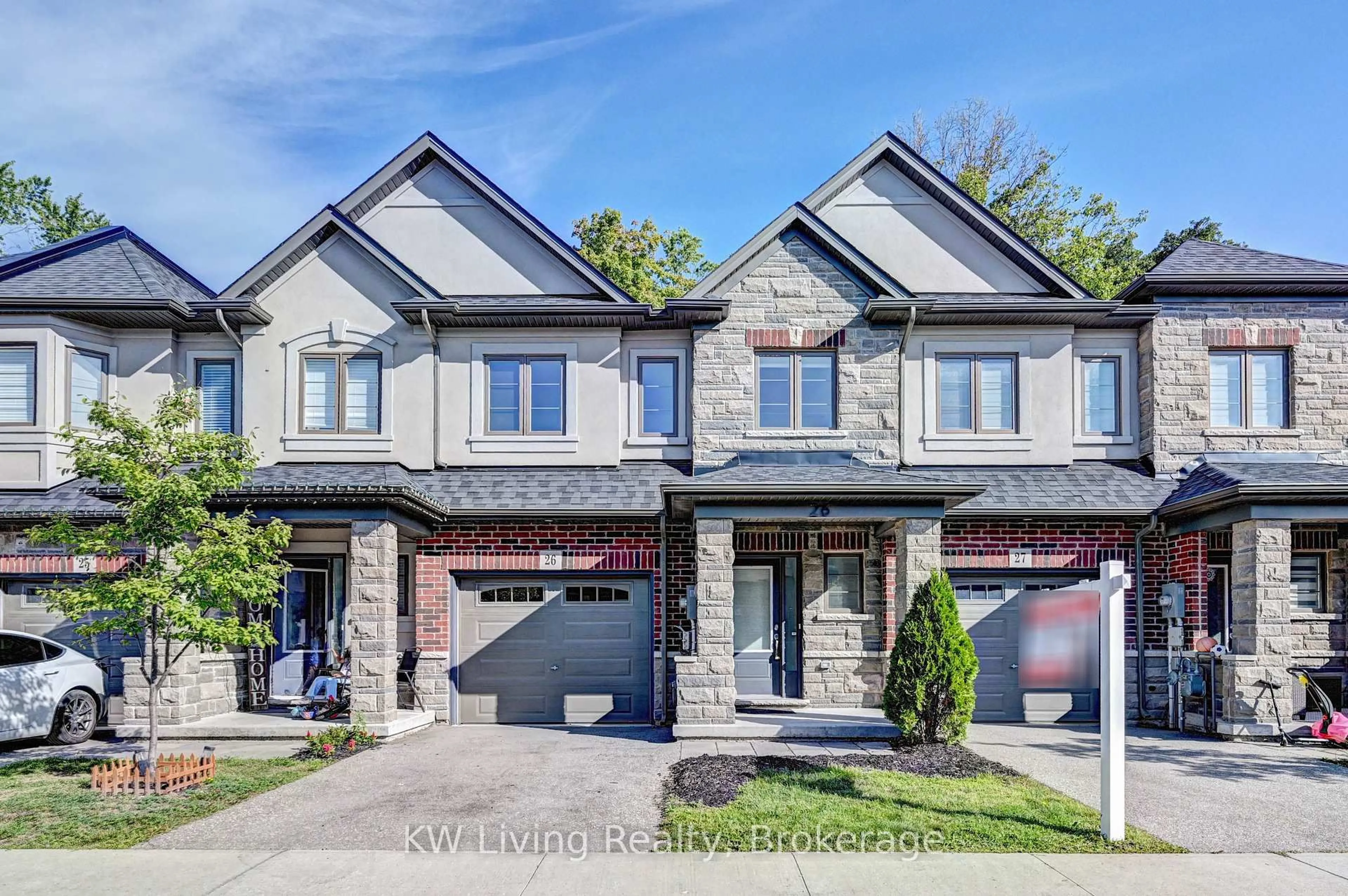 Home with brick exterior material, street for 324 Equestrian Way #26, Cambridge Ontario N3E 0E2