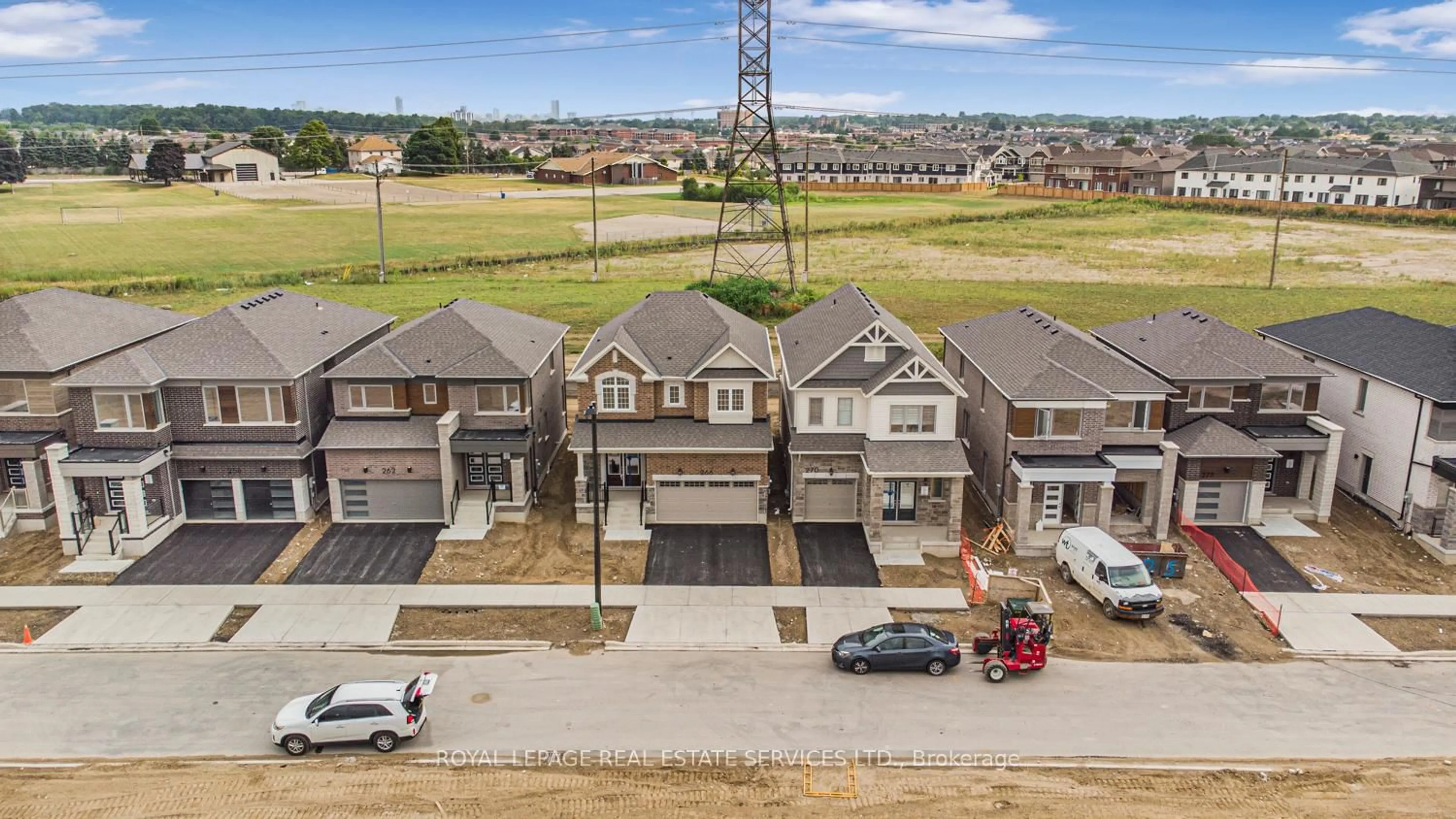 A pic from outside/outdoor area/front of a property/back of a property/a pic from drone, street for 266 Millstone St, Kitchener Ontario N2R 0V8