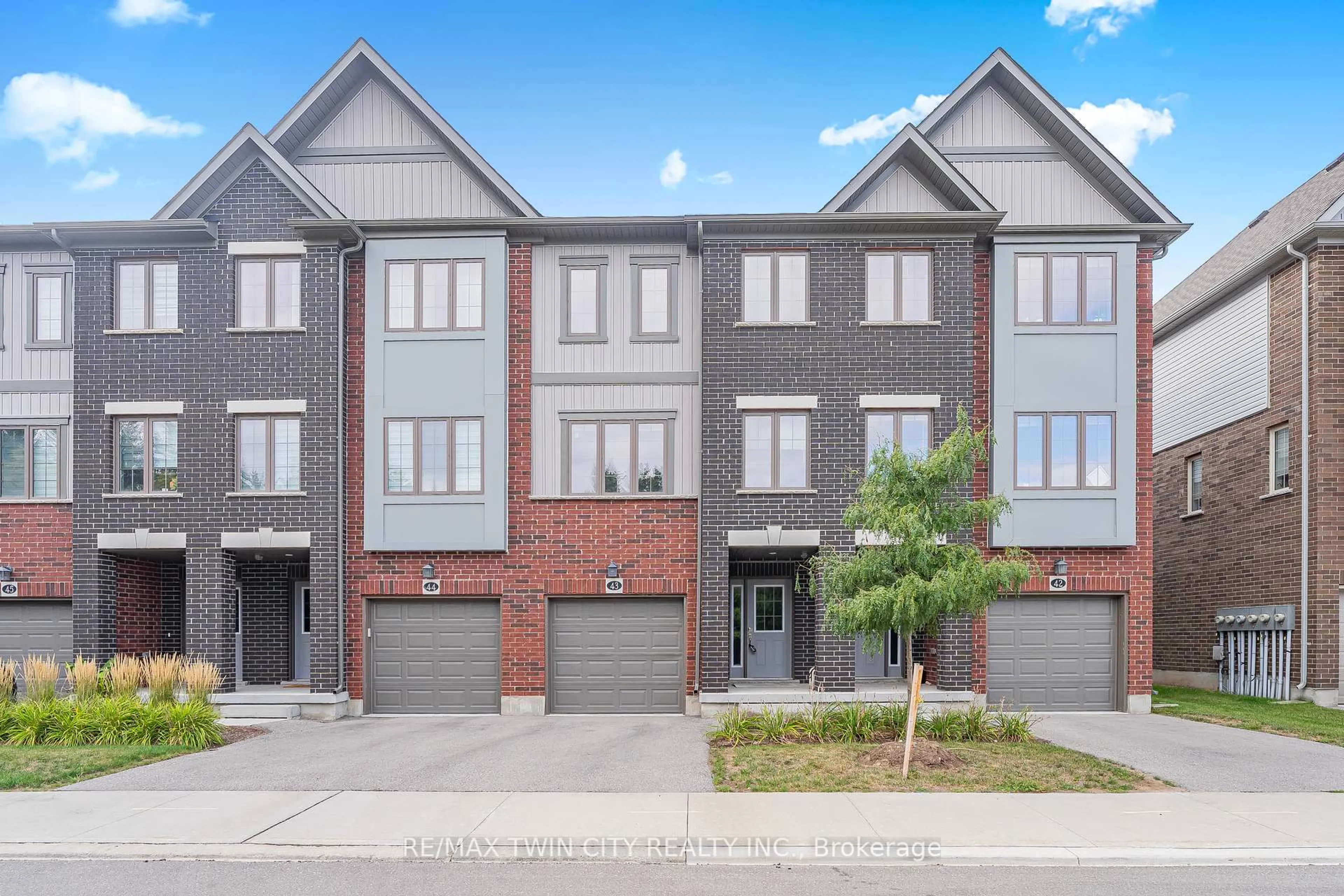 Home with brick exterior material, street for 311 Woolwich St #43, Waterloo Ontario N2K 0H4