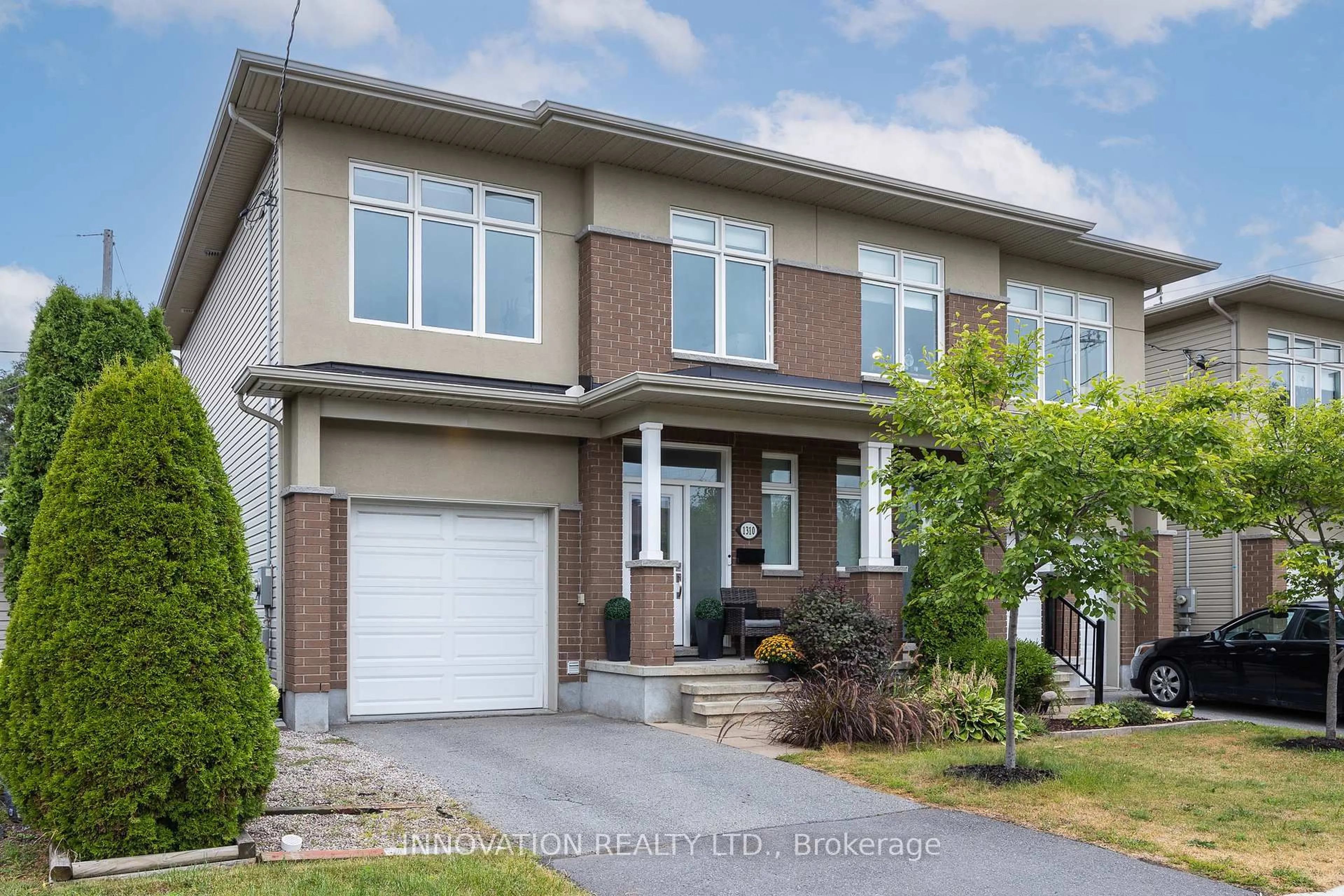 Home with brick exterior material, street for 1310 Avenue P Ave, Ottawa Ontario K1G 0B3