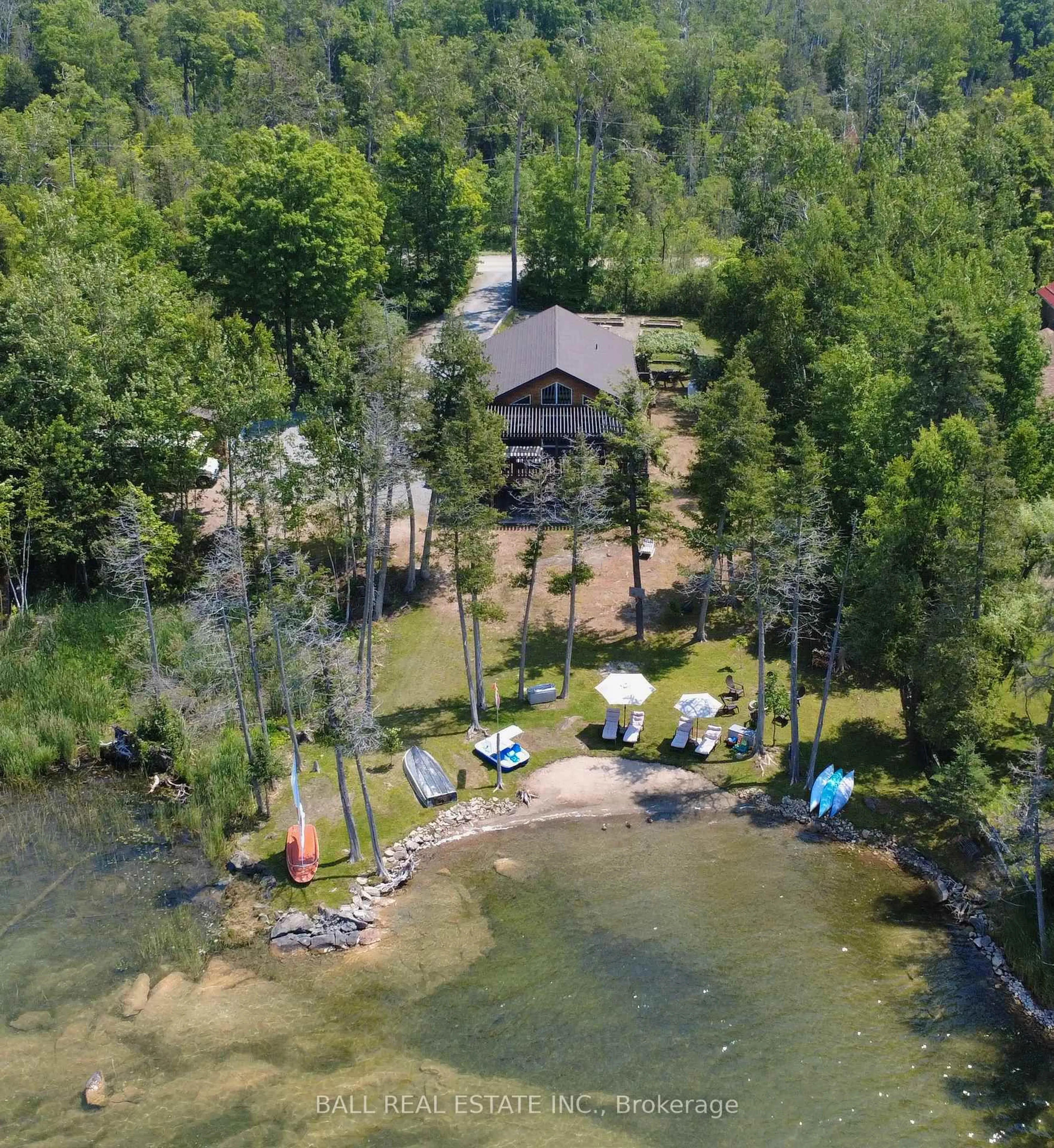 A pic from outside/outdoor area/front of a property/back of a property/a pic from drone, water/lake/river/ocean view for 154 JULIAN LAKE Rd, North Kawartha Ontario K0L 3E0