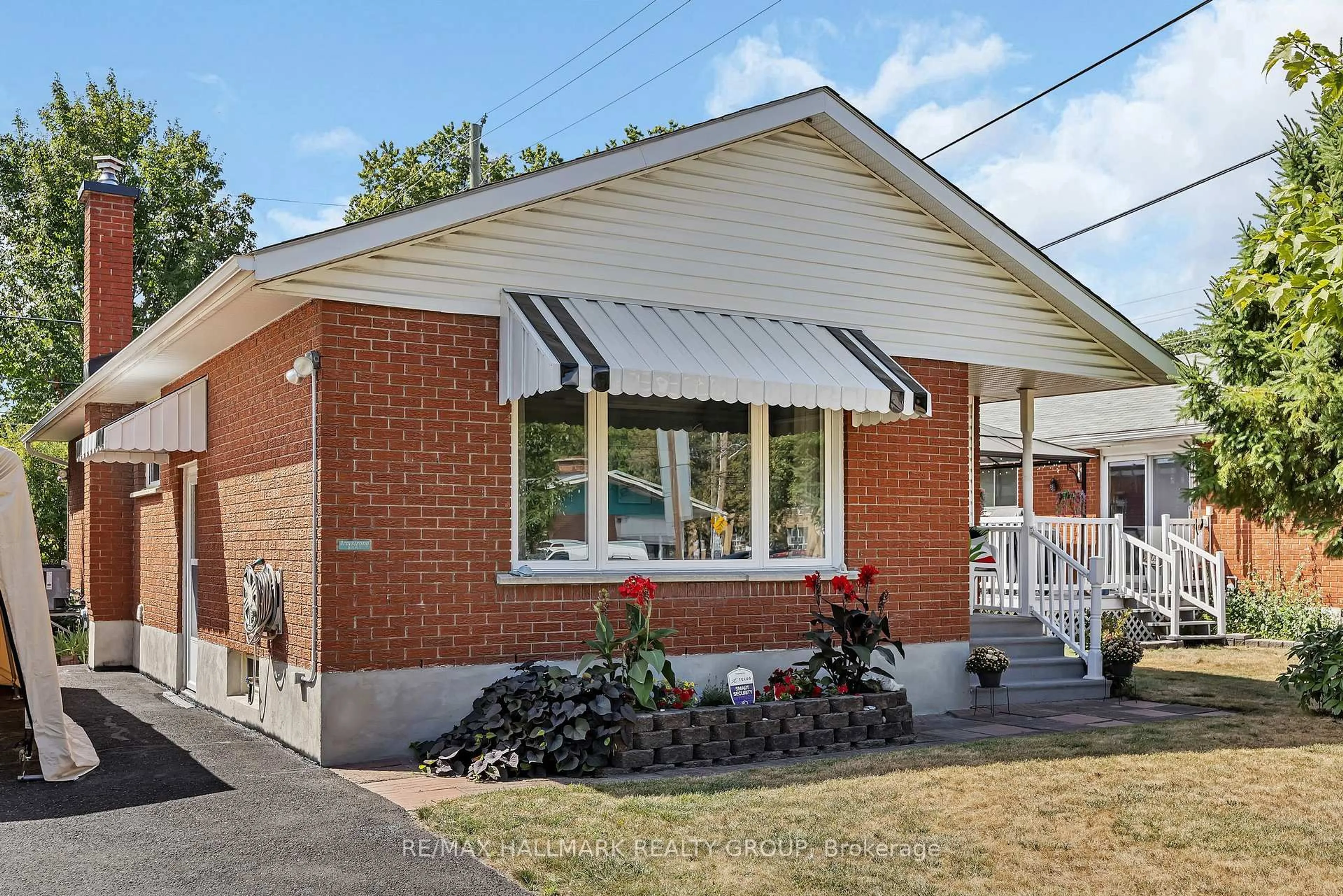 Home with brick exterior material, street for 1144 Cobden Rd, Ottawa Ontario K2C 2Z3