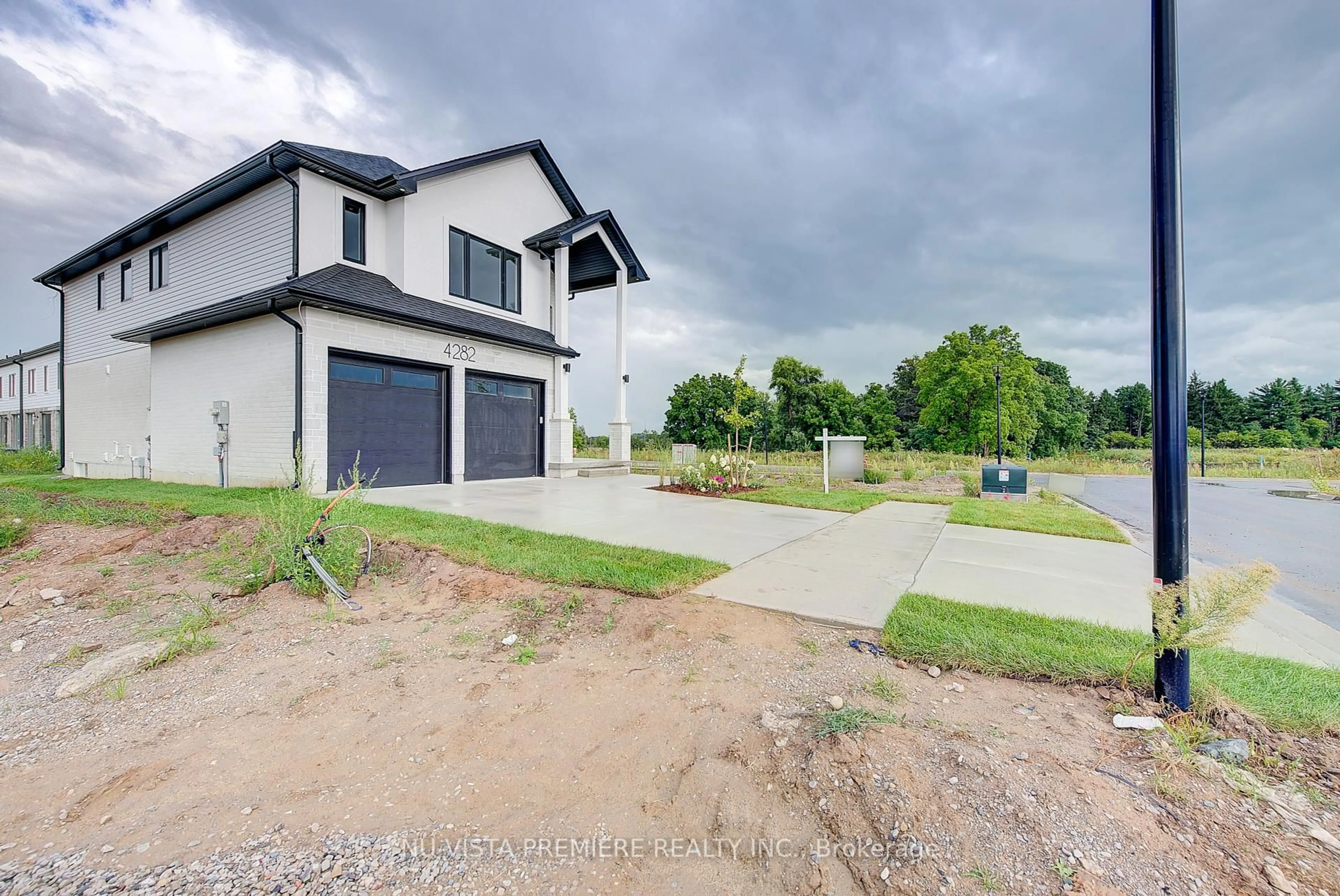 A pic from outside/outdoor area/front of a property/back of a property/a pic from drone, street for 4282 Liberty Crossing, London South Ontario N6P 1J9