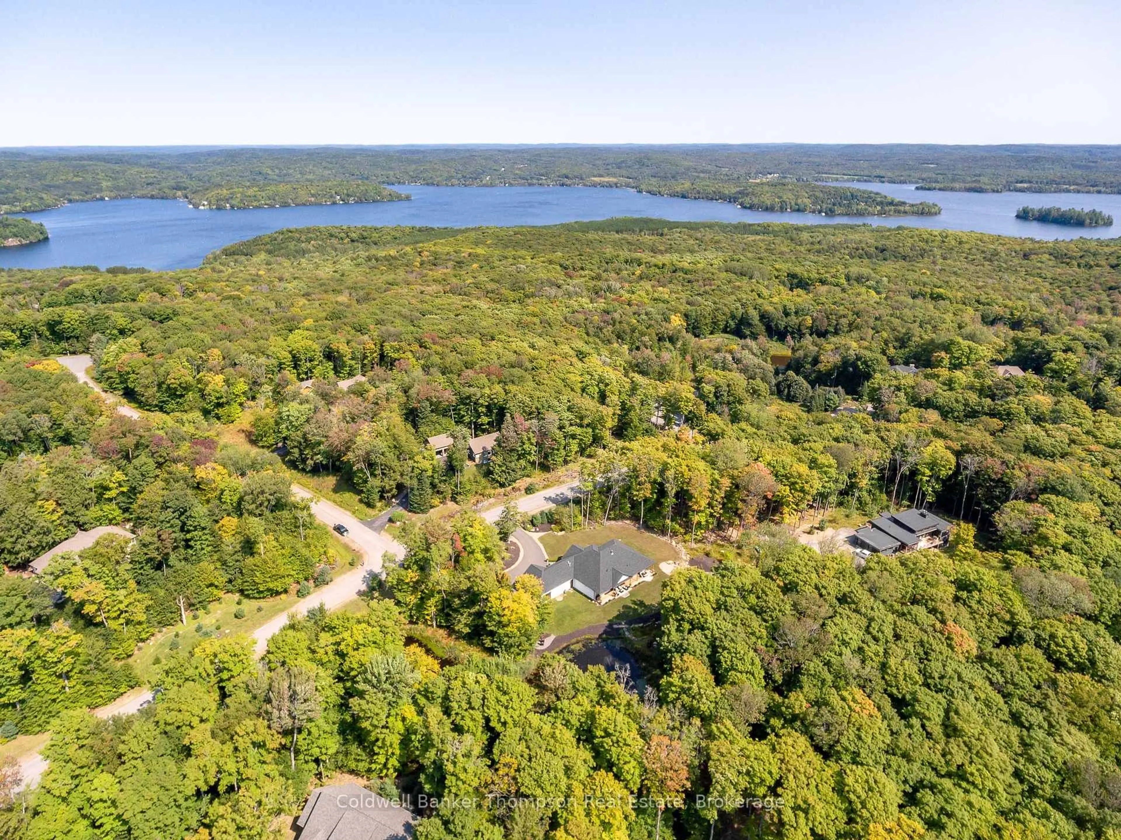 A pic from outside/outdoor area/front of a property/back of a property/a pic from drone, water/lake/river/ocean view for 6 Royal Oak Cres, Huntsville Ontario P1H 0A8