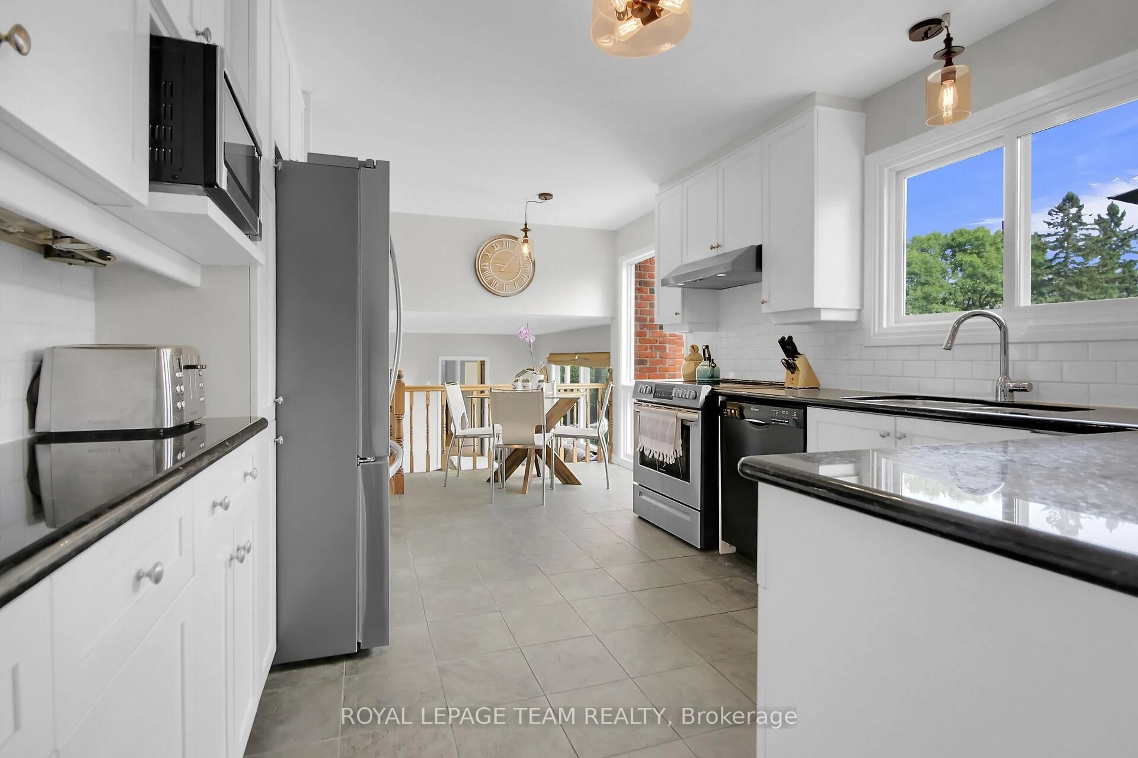 Open concept kitchen, ceramic/tile floor for 87 Pentland Pl, Kanata Ontario K2K 1V9