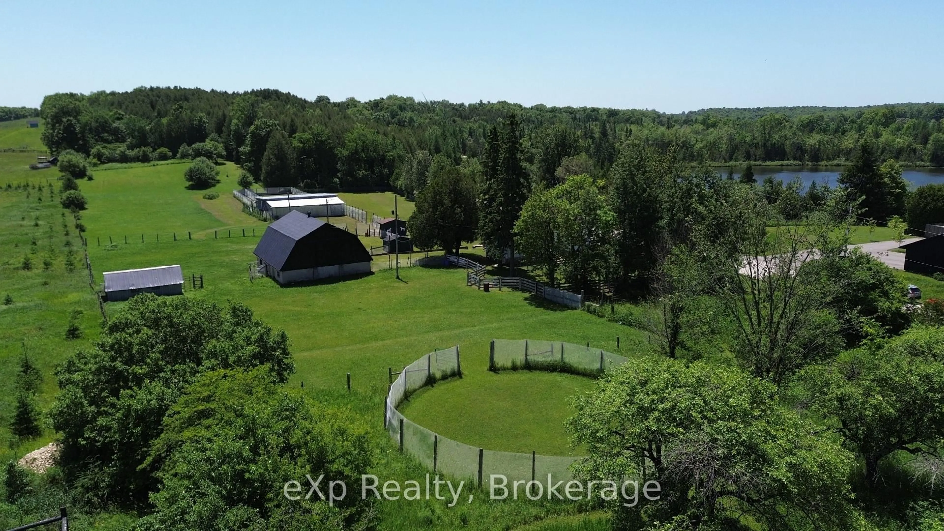 A pic from outside/outdoor area/front of a property/back of a property/a pic from drone, water/lake/river/ocean view for 125 Lake Dr, West Grey Ontario N0C 1H0