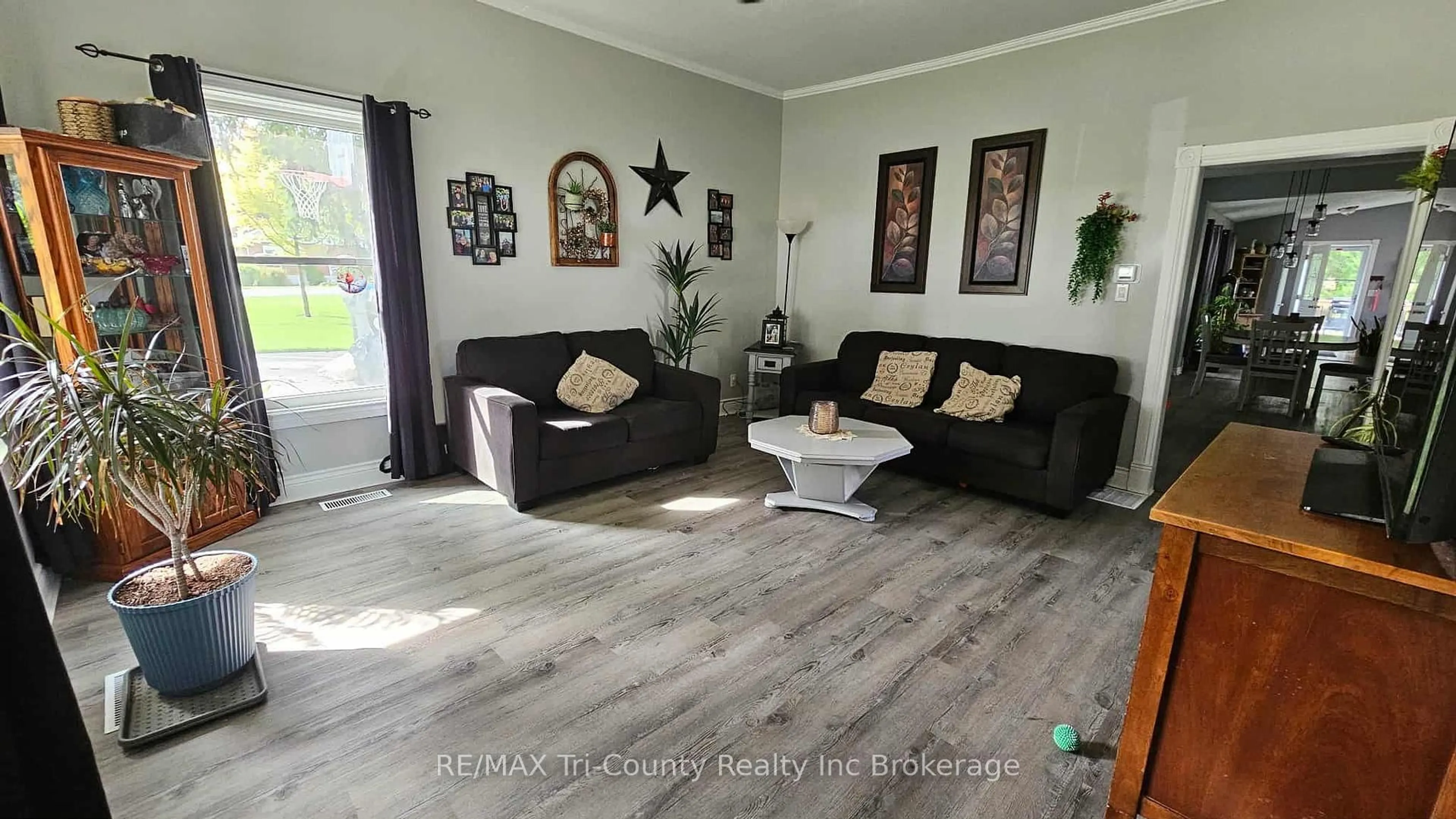 Living room with furniture, wood/laminate floor for 27 Harpurhey Rd, Huron East Ontario N0K 1W0