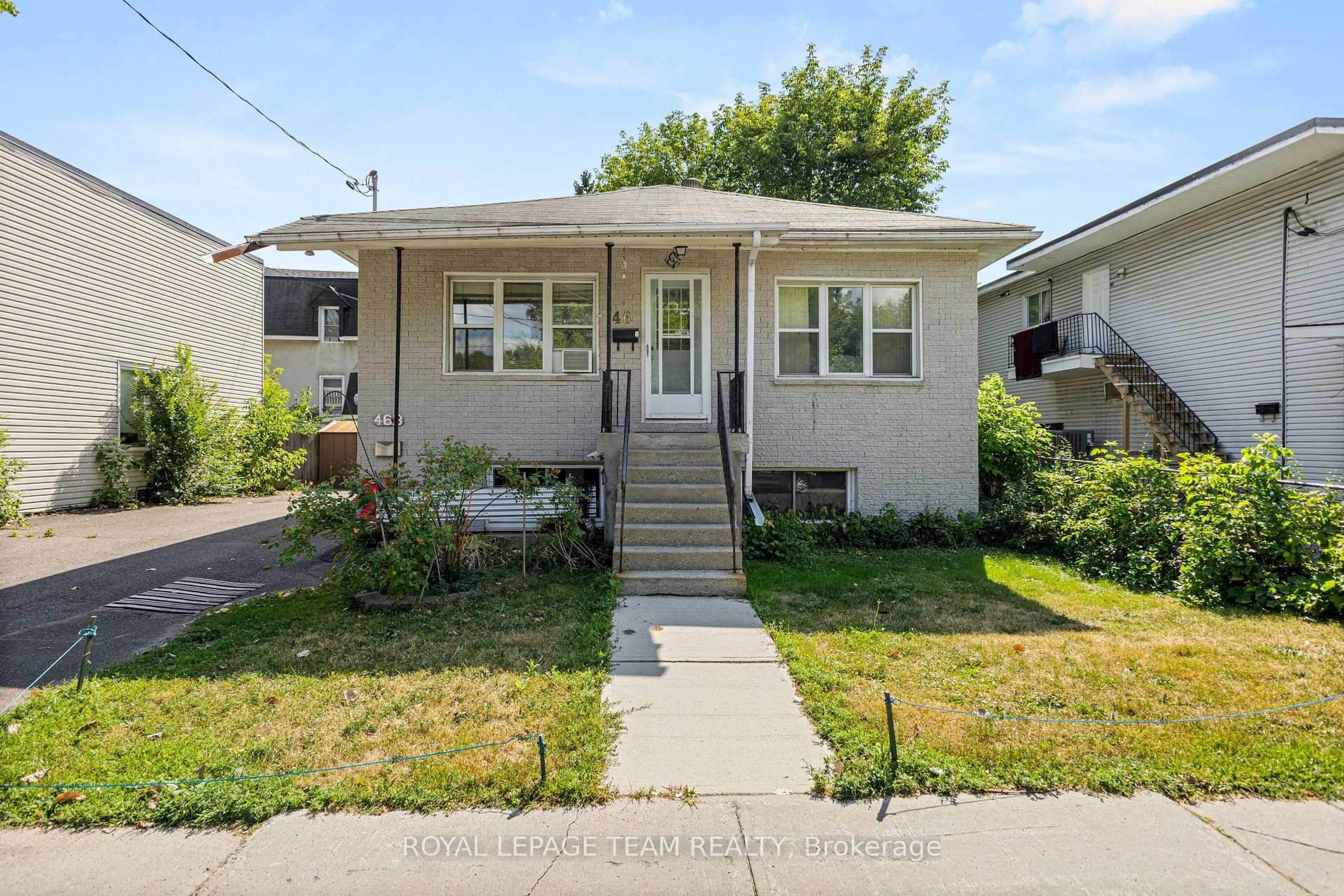 Home with vinyl exterior material, street for 46 Jolliet St, Ottawa Ontario K1L 5H5