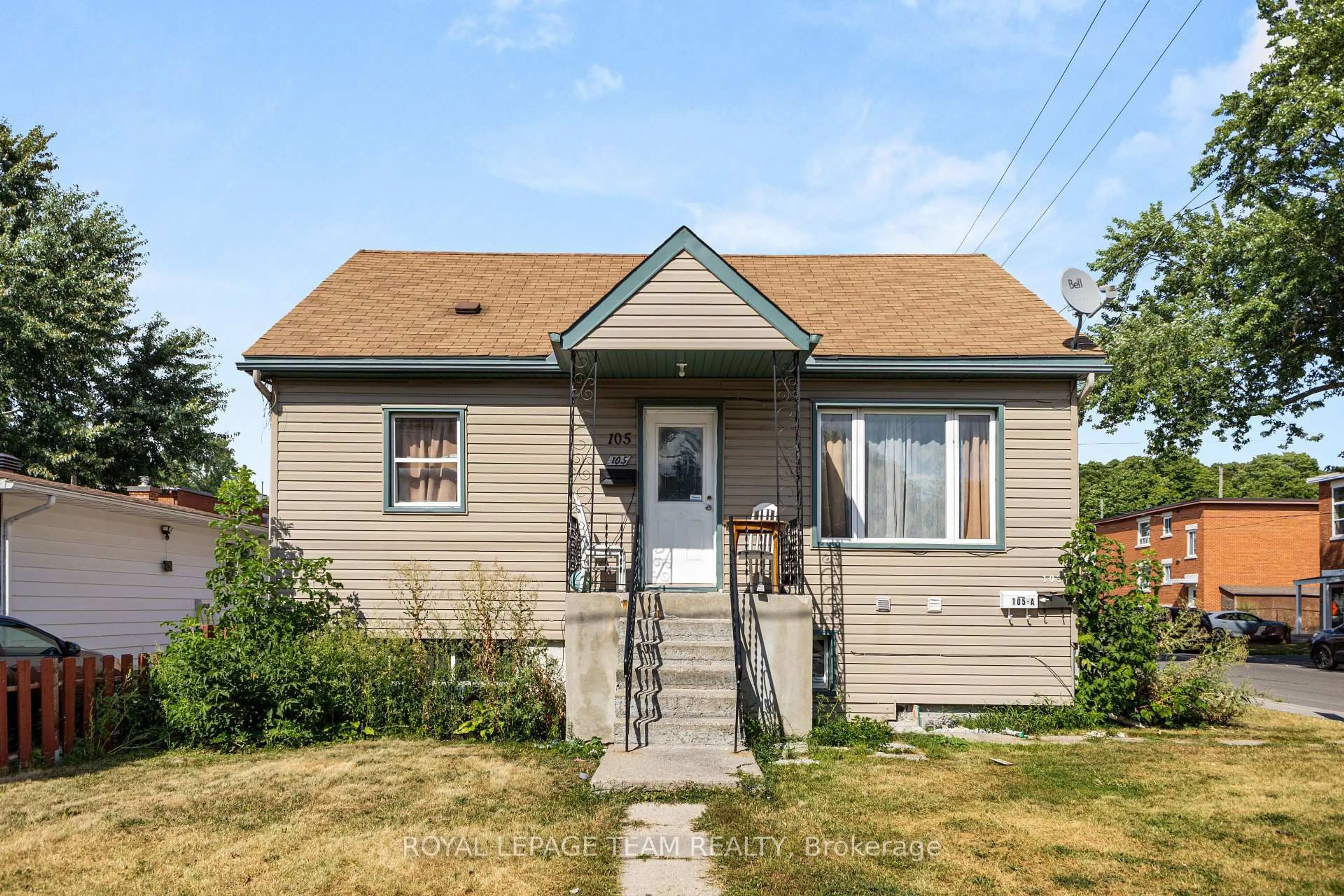 Home with vinyl exterior material, street for 105 Jolliet Ave, Ottawa Ontario K1L 5H1
