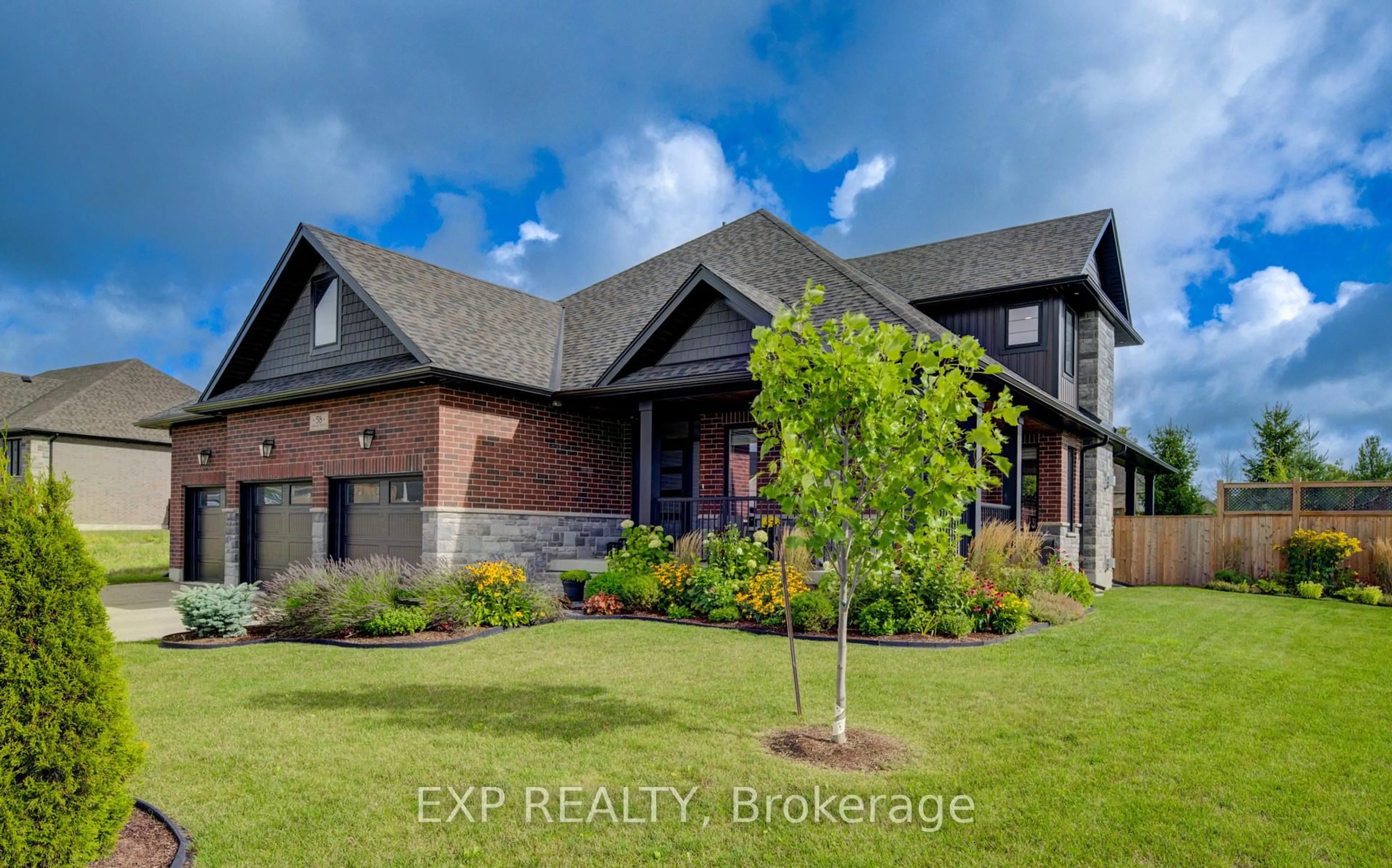Home with brick exterior material, street for 58 Carriage Crossing, Mapleton Ontario N0G 1P0