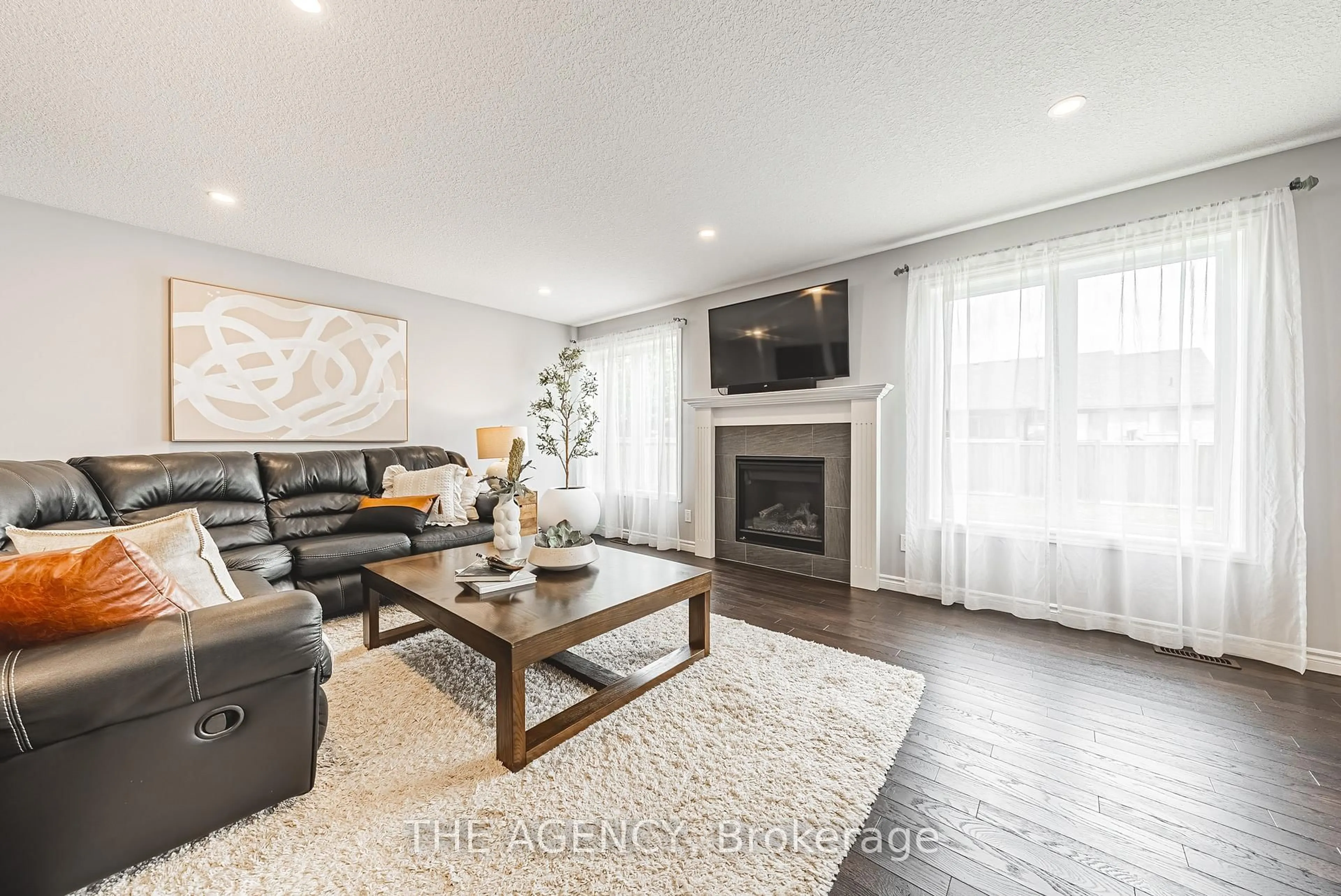 Living room with furniture, wood/laminate floor for 58 curtis St, East Zorra-Tavistock Ontario N0J 1M0