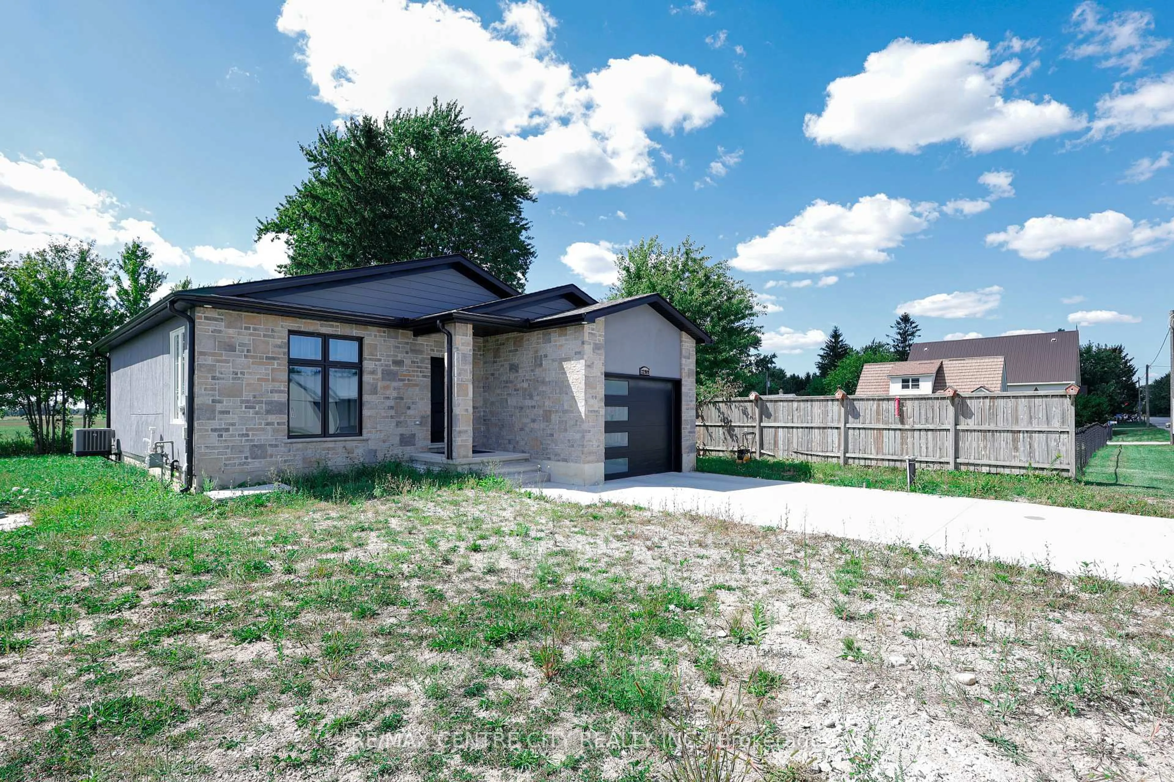 Home with brick exterior material, street for 22909 Highbury Ave, Middlesex Centre Ontario N0M 2A0