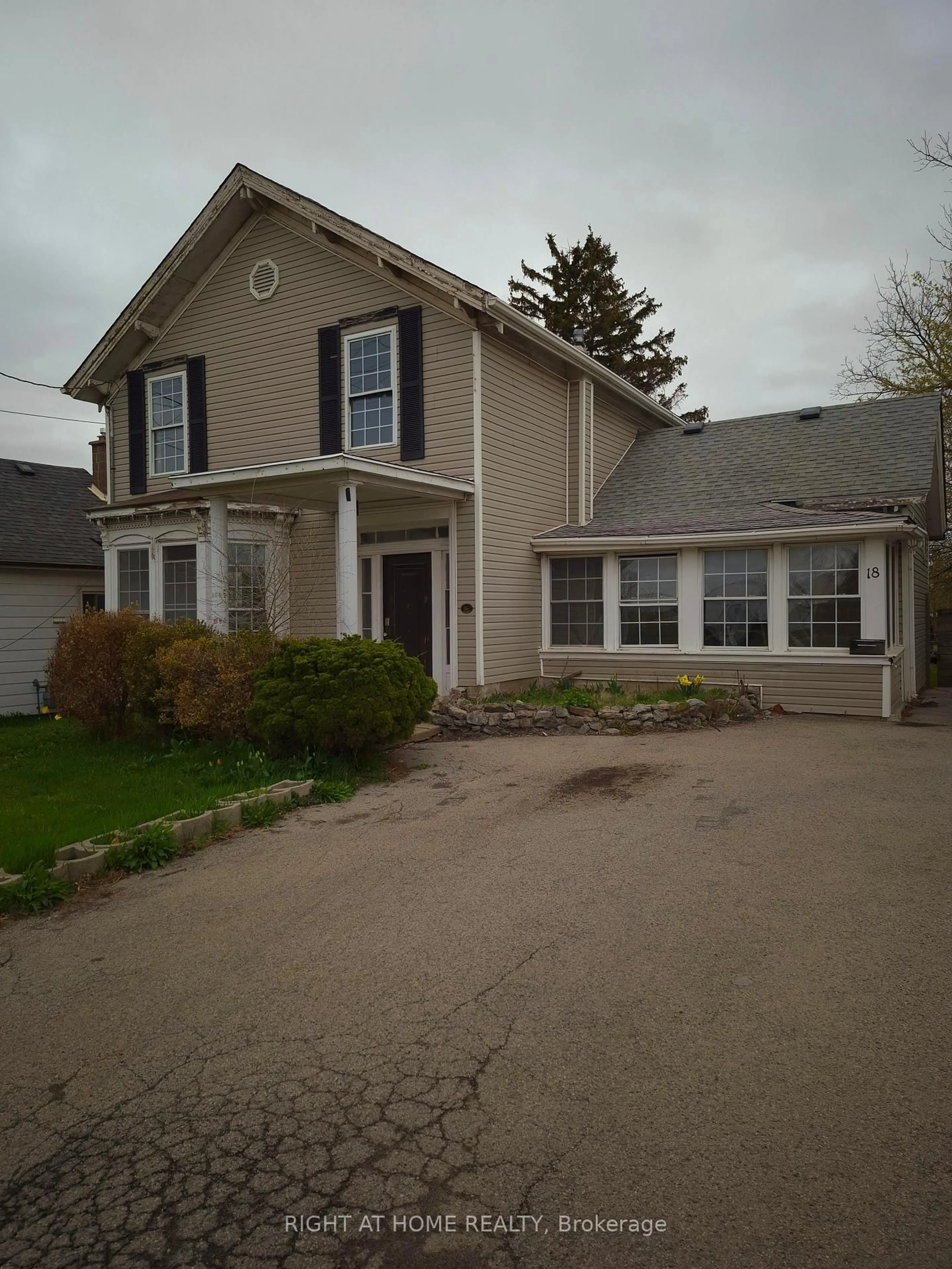 Home with vinyl exterior material, street for 18 Merritt St, St. Catharines Ontario L2T 1J3