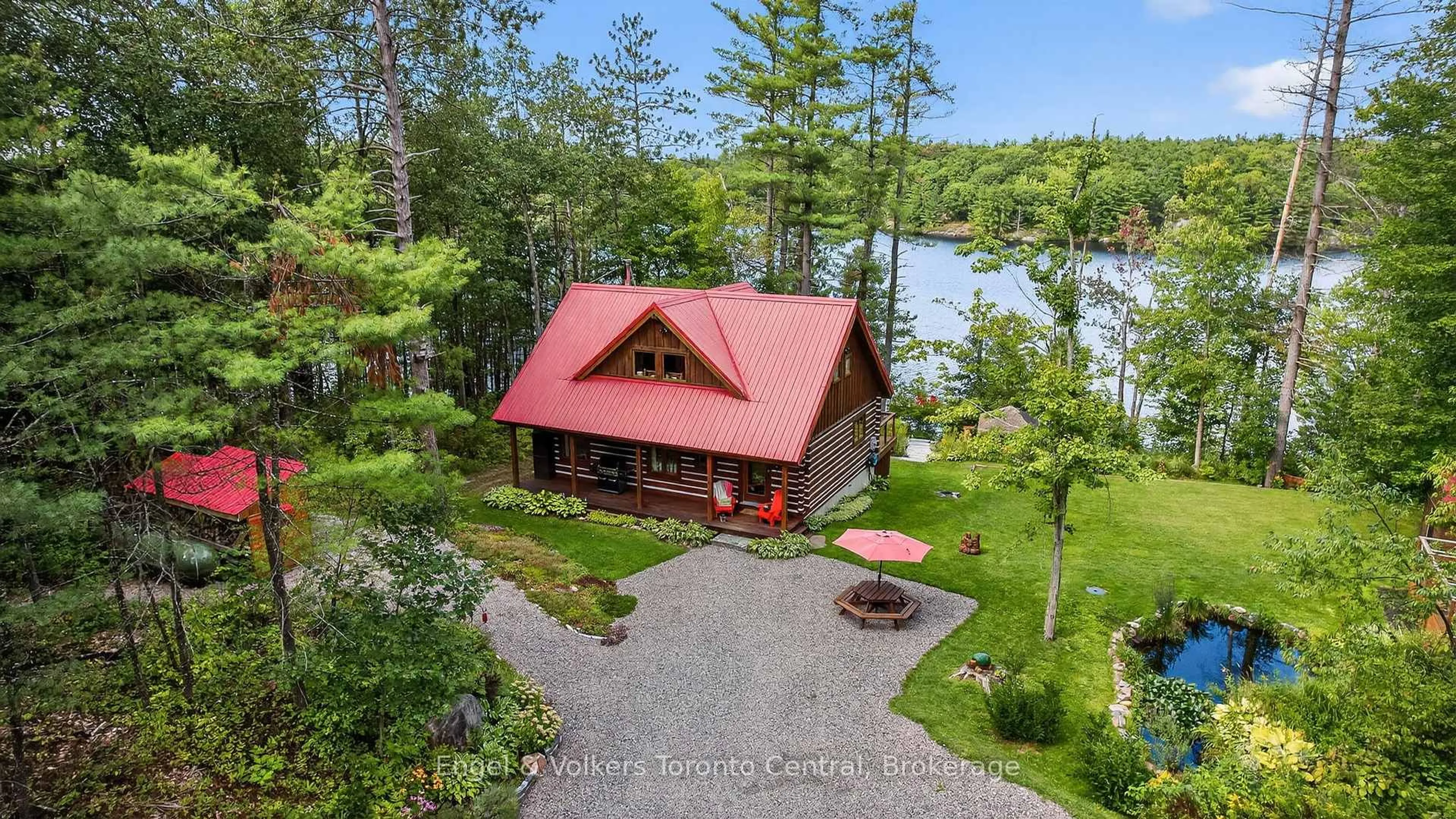 A pic from outside/outdoor area/front of a property/back of a property/a pic from drone, water/lake/river/ocean view for 1750 Frank Cooper Tr, Gravenhurst Ontario P1P 1R3