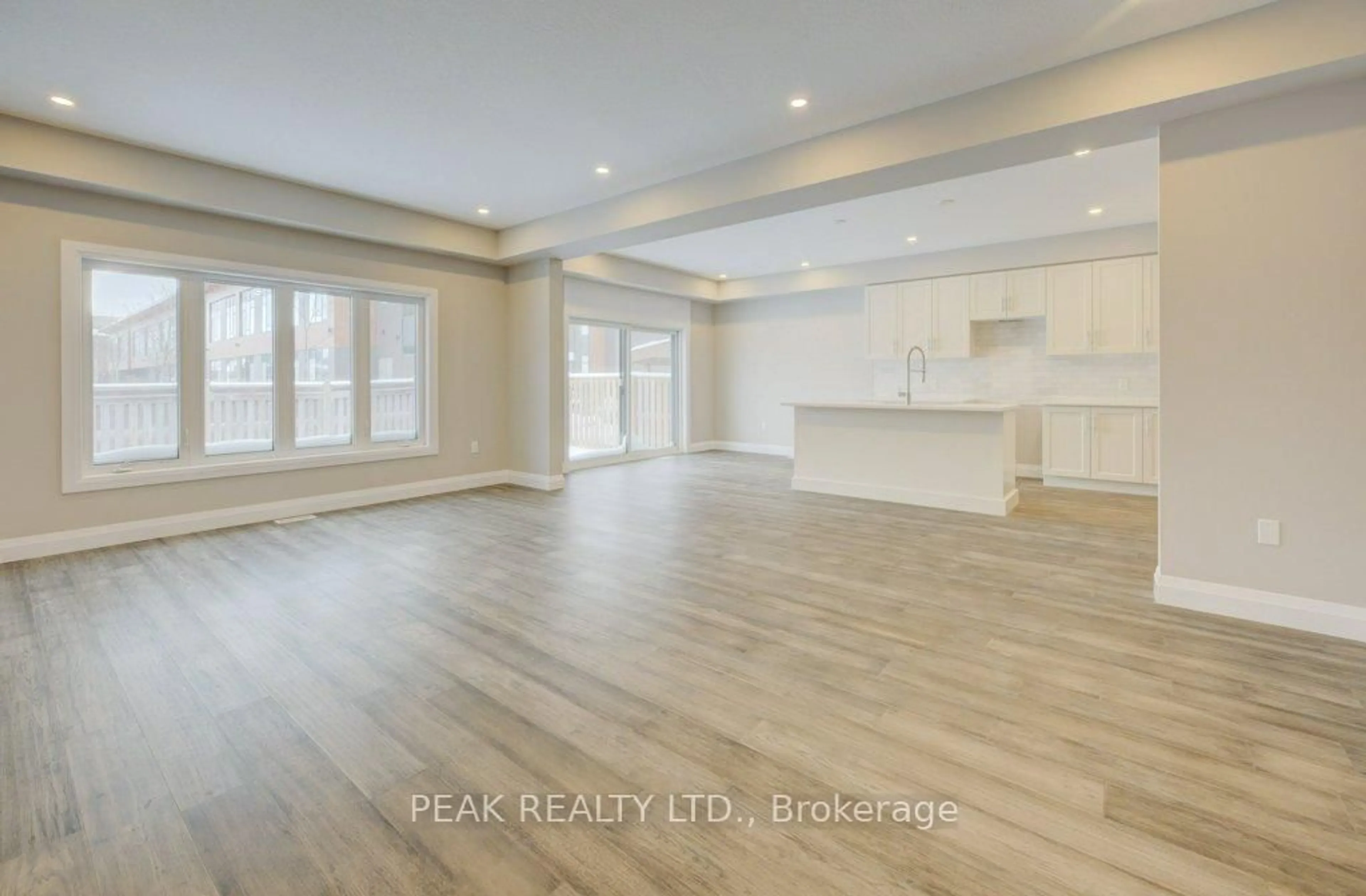 Open concept kitchen, wood/laminate floor for 94 Isaac St, Woolwich Ontario N3B 0E2