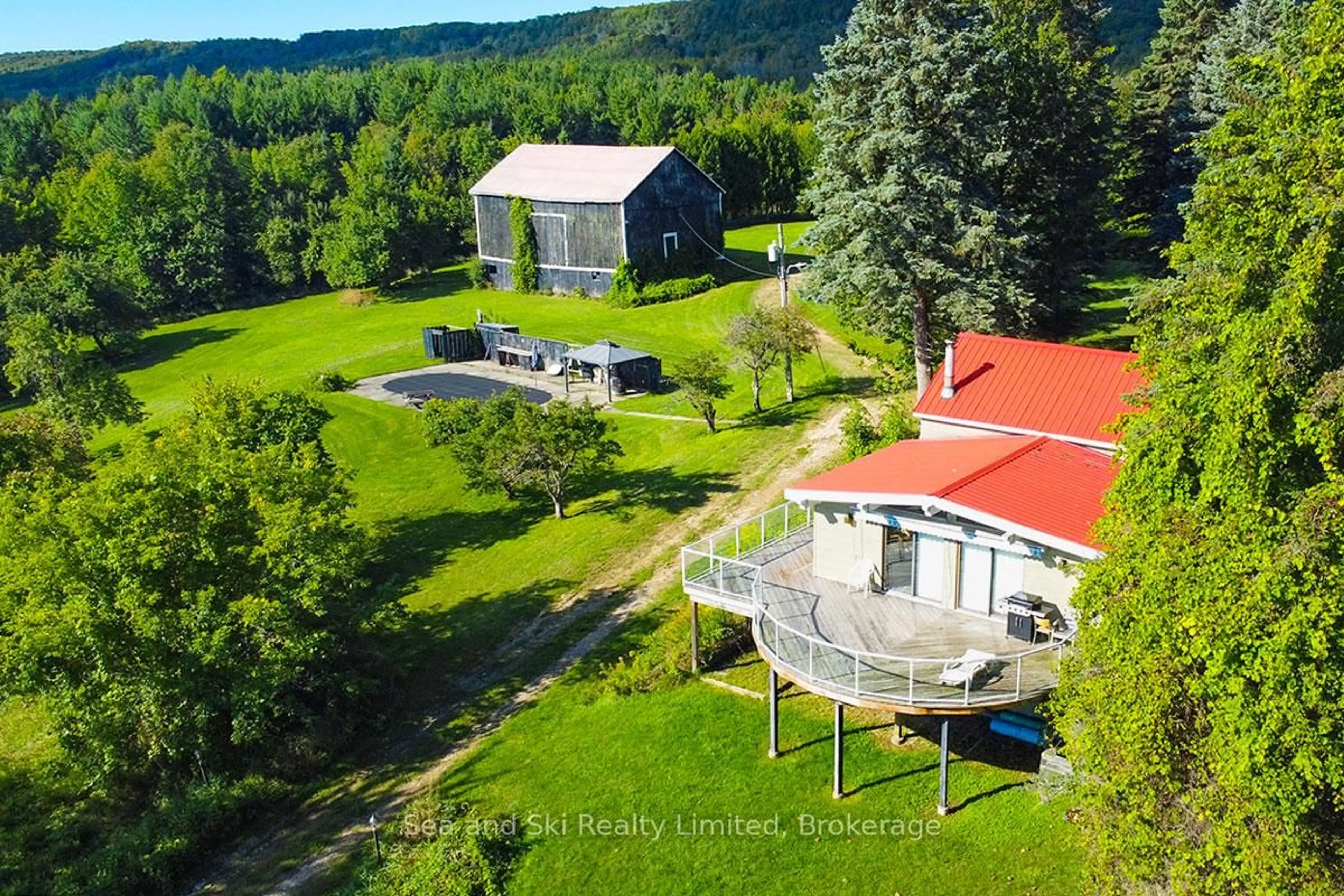 A pic from outside/outdoor area/front of a property/back of a property/a pic from drone, water/lake/river/ocean view for 195908 Grey Road 7 Rd, Grey Highlands Ontario N0C 1G0