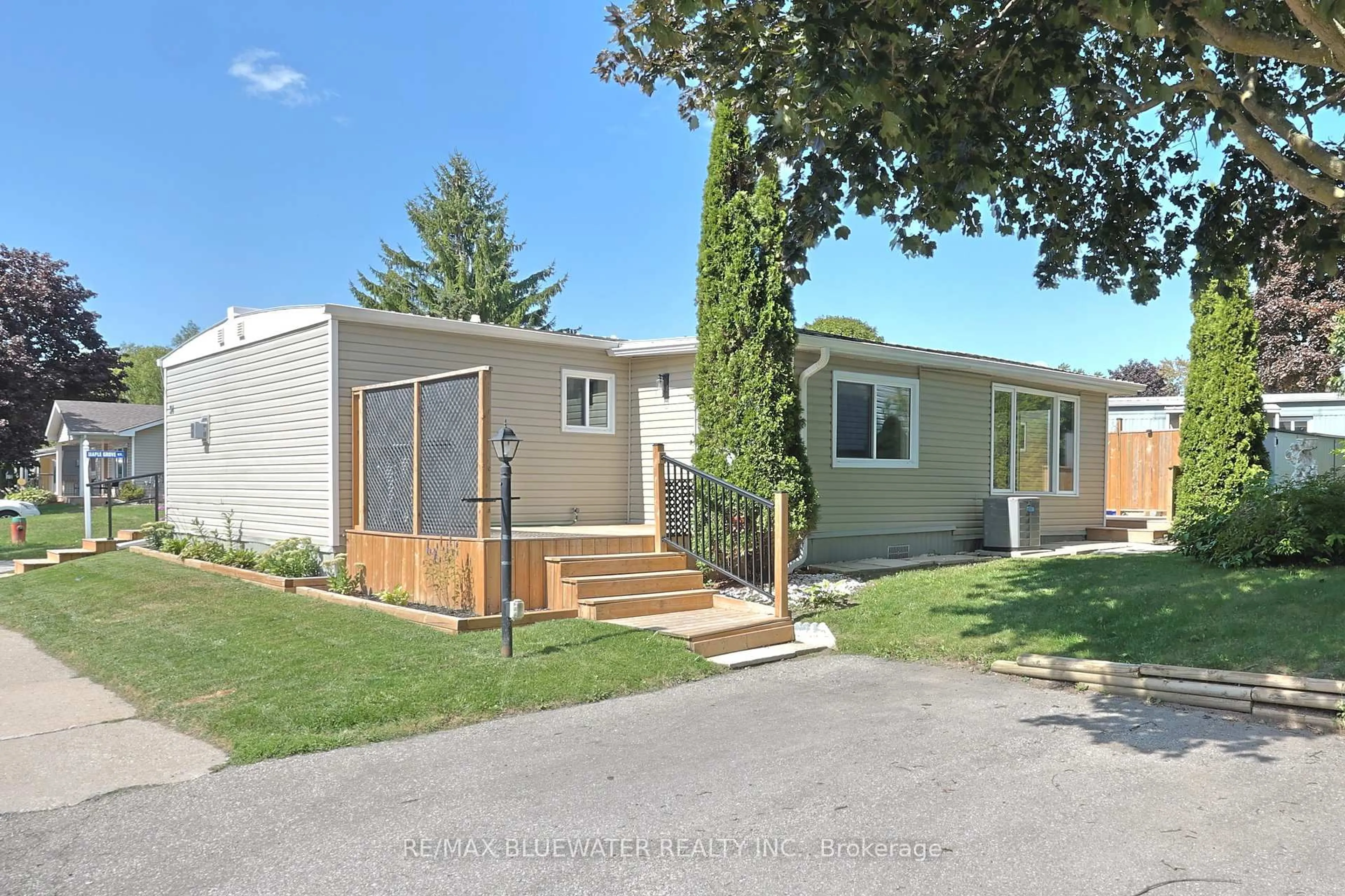 Home with vinyl exterior material, street for 34 Pebble Beach Pkwy, South Huron Ontario N0M 1T0