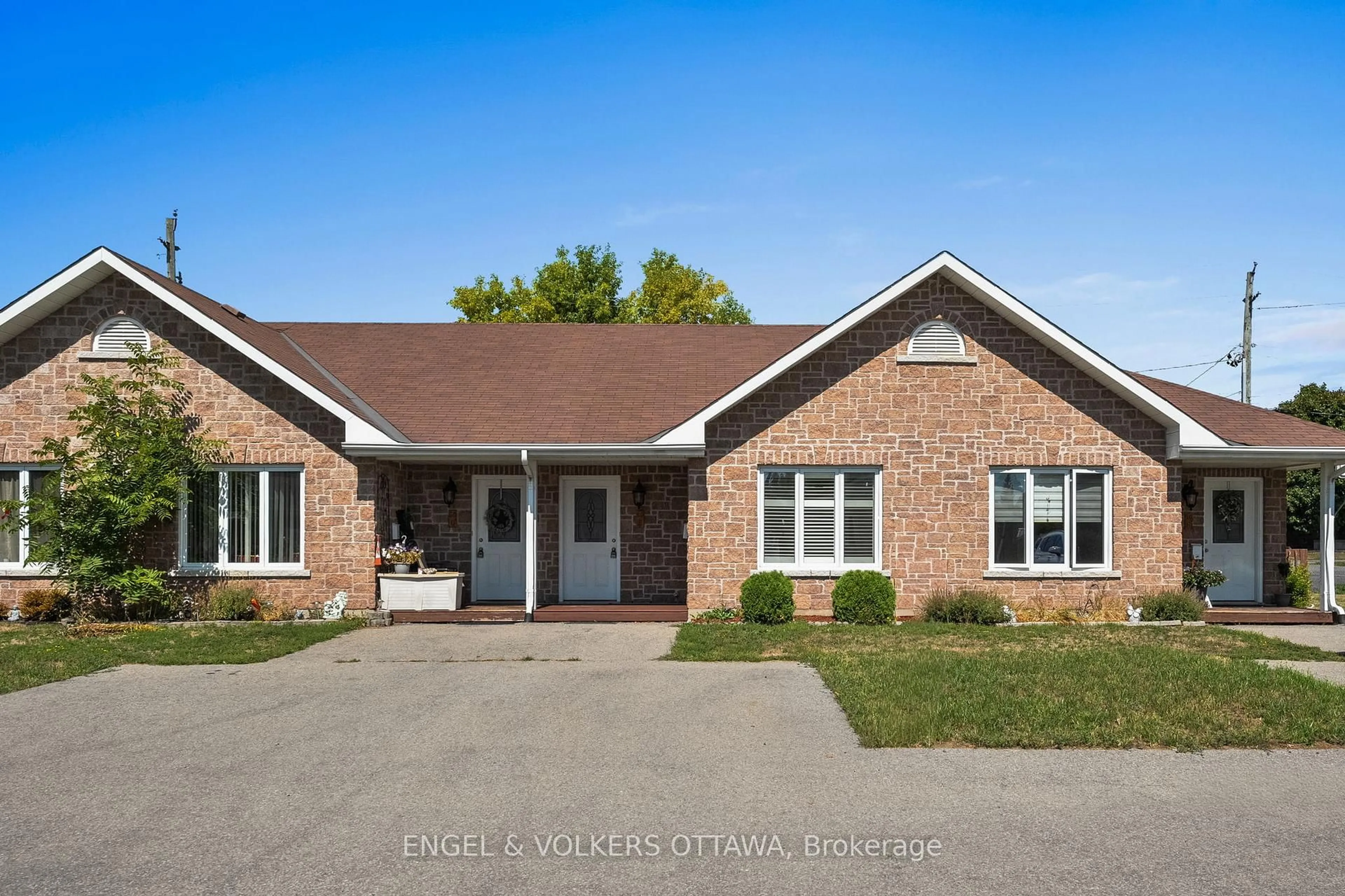 Home with brick exterior material, street for 50 Fifth St #E, South Dundas Ontario K0C 1X0