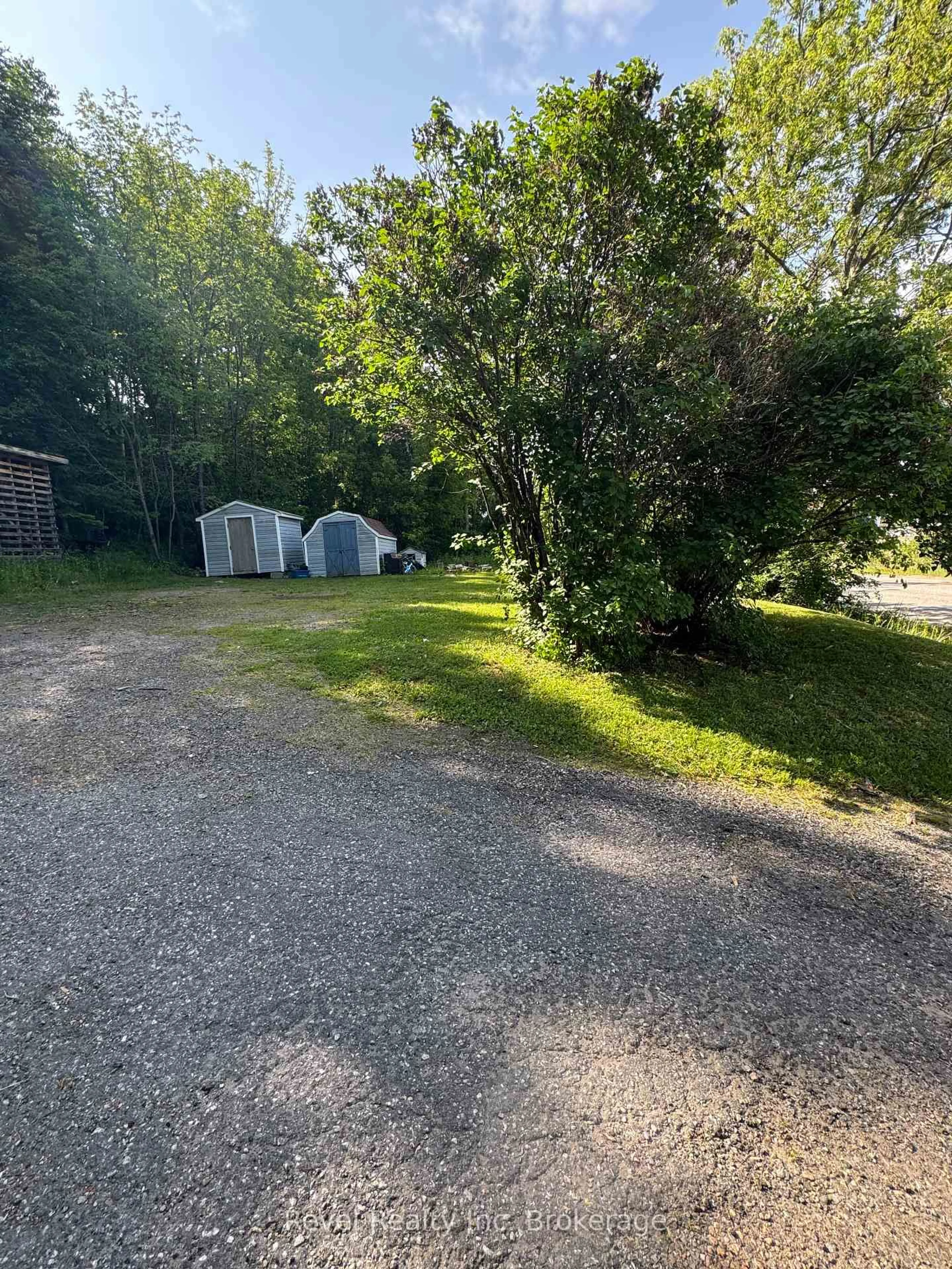 A pic from outside/outdoor area/front of a property/back of a property/a pic from drone, unknown for 218 Railway St, Bonfield Ontario P0H 1E0