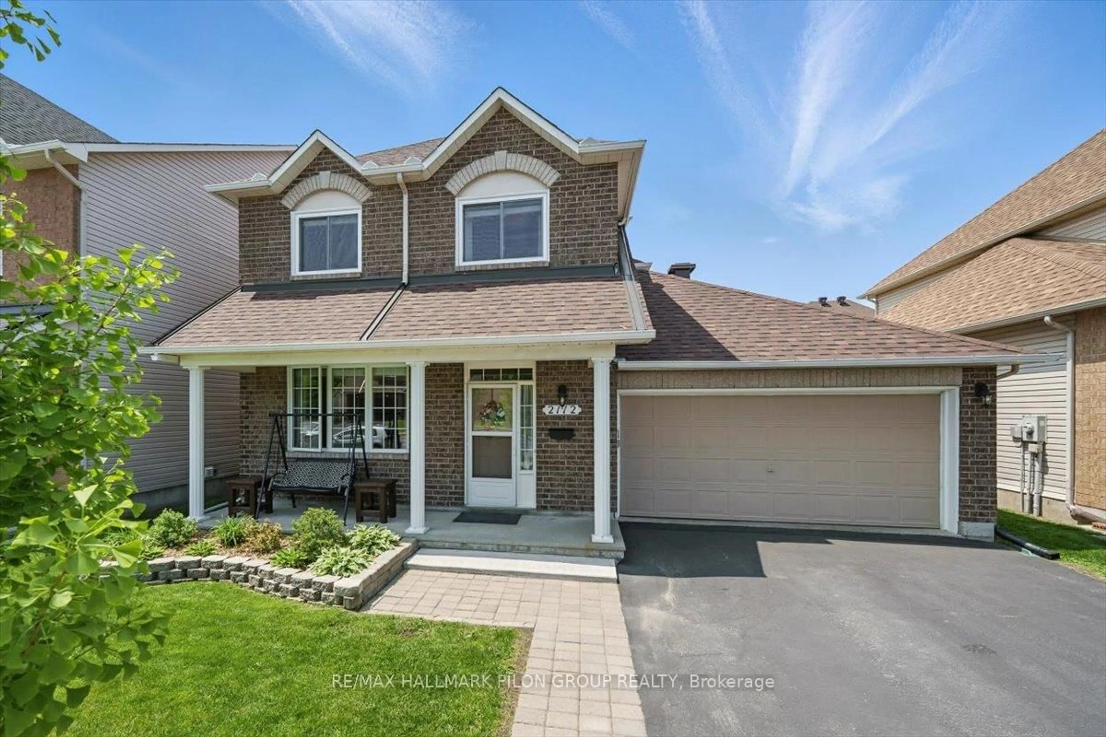 Home with brick exterior material, street for 2112 Esprit Dr, Ottawa Ontario K4A 4G3