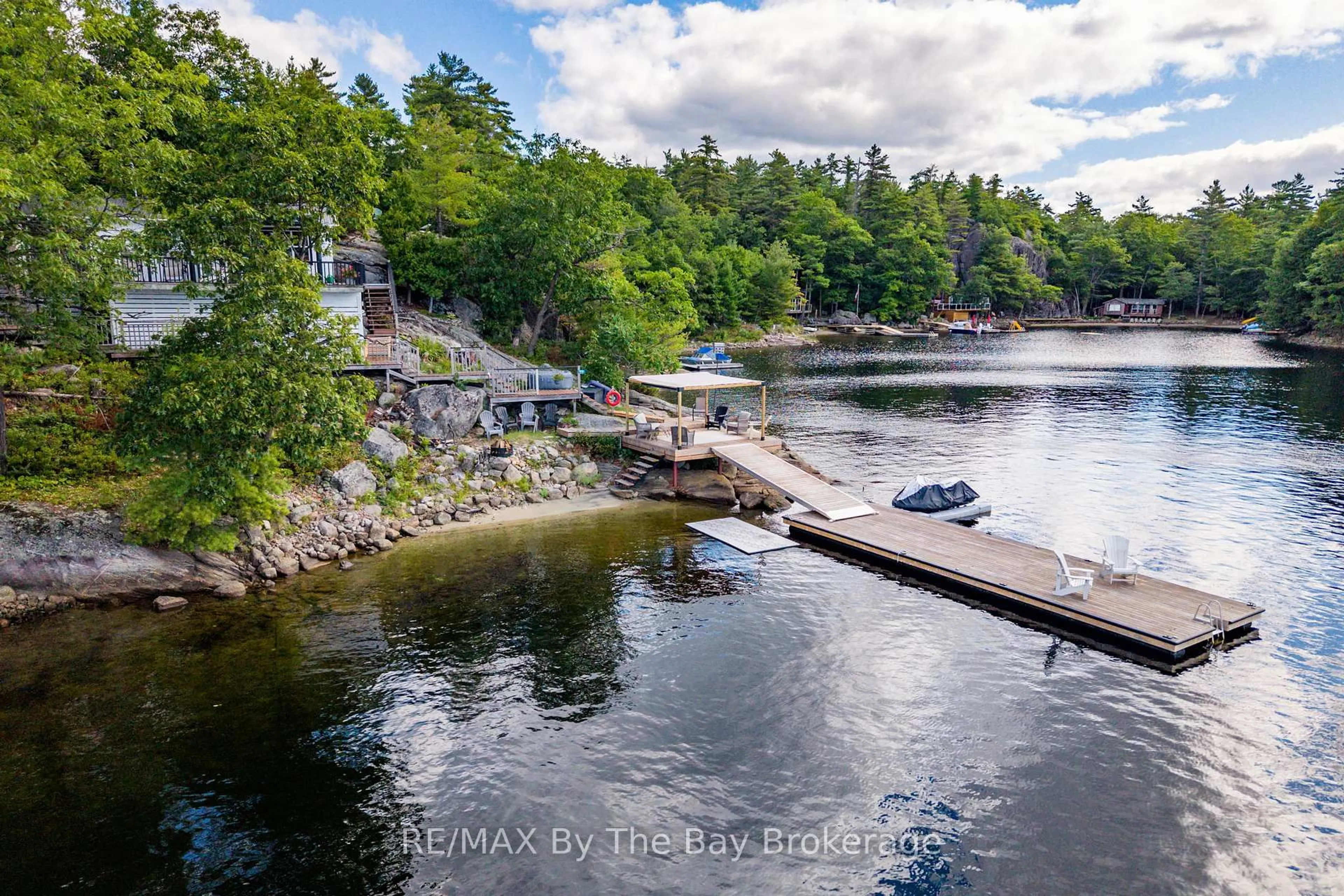 A pic from outside/outdoor area/front of a property/back of a property/a pic from drone, water/lake/river/ocean view for 18588 Georgian Bay Shore, Georgian Bay Ontario P0E 1E0