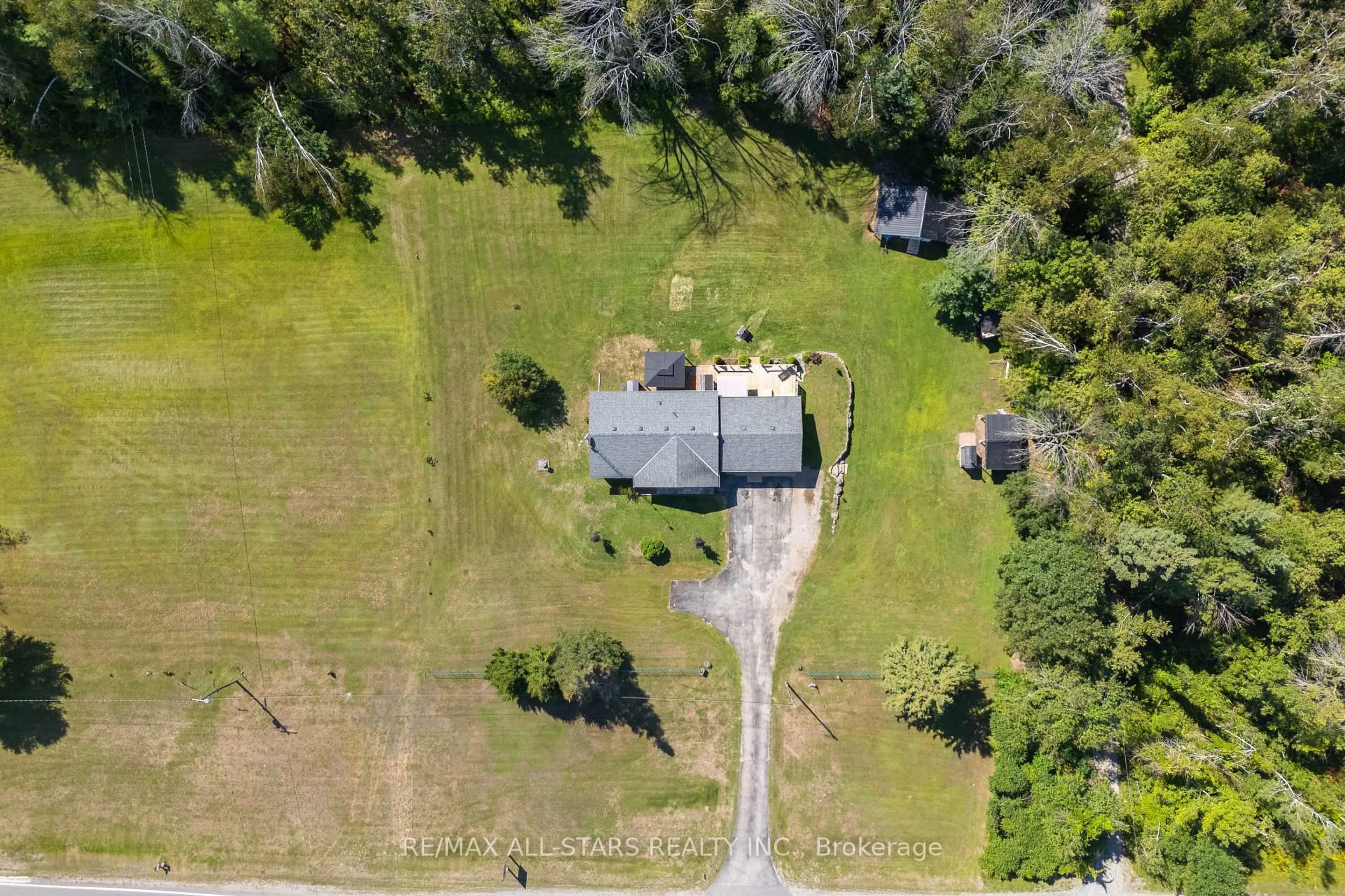 A pic from outside/outdoor area/front of a property/back of a property/a pic from drone, unknown for 6077 Hwy 35, Kawartha Lakes Ontario K0M 1N0