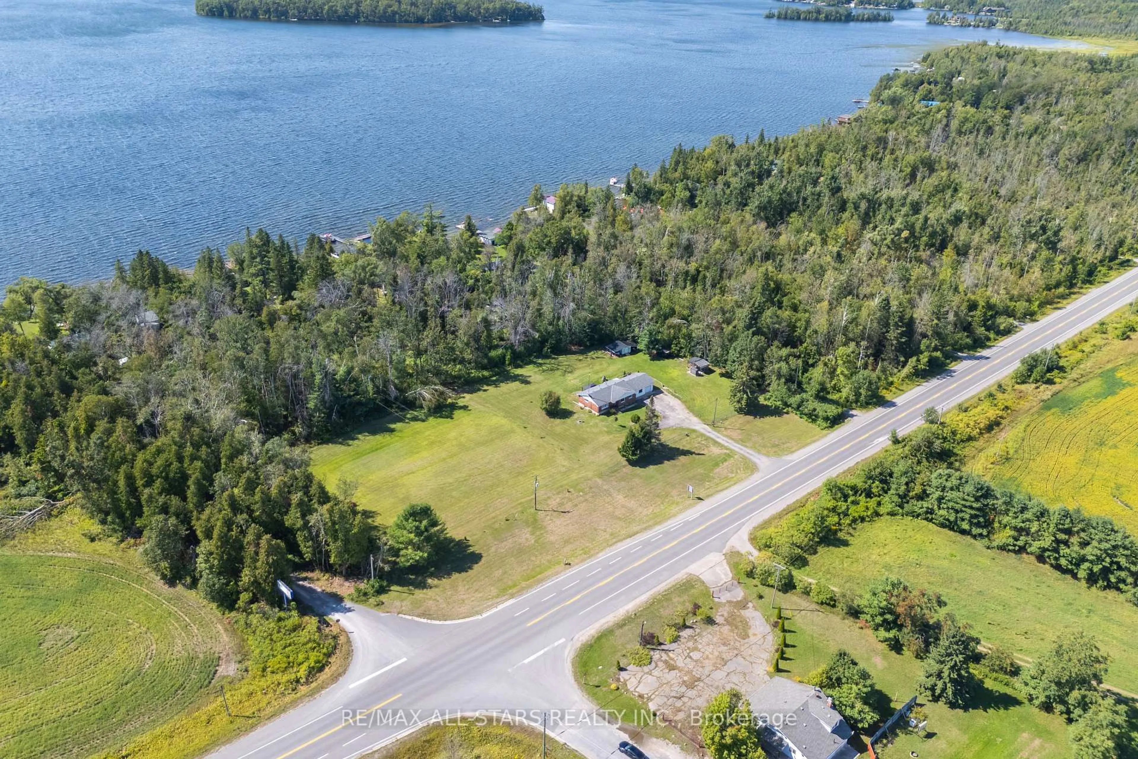 A pic from outside/outdoor area/front of a property/back of a property/a pic from drone, water/lake/river/ocean view for 6077 Hwy 35, Kawartha Lakes Ontario K0M 1N0