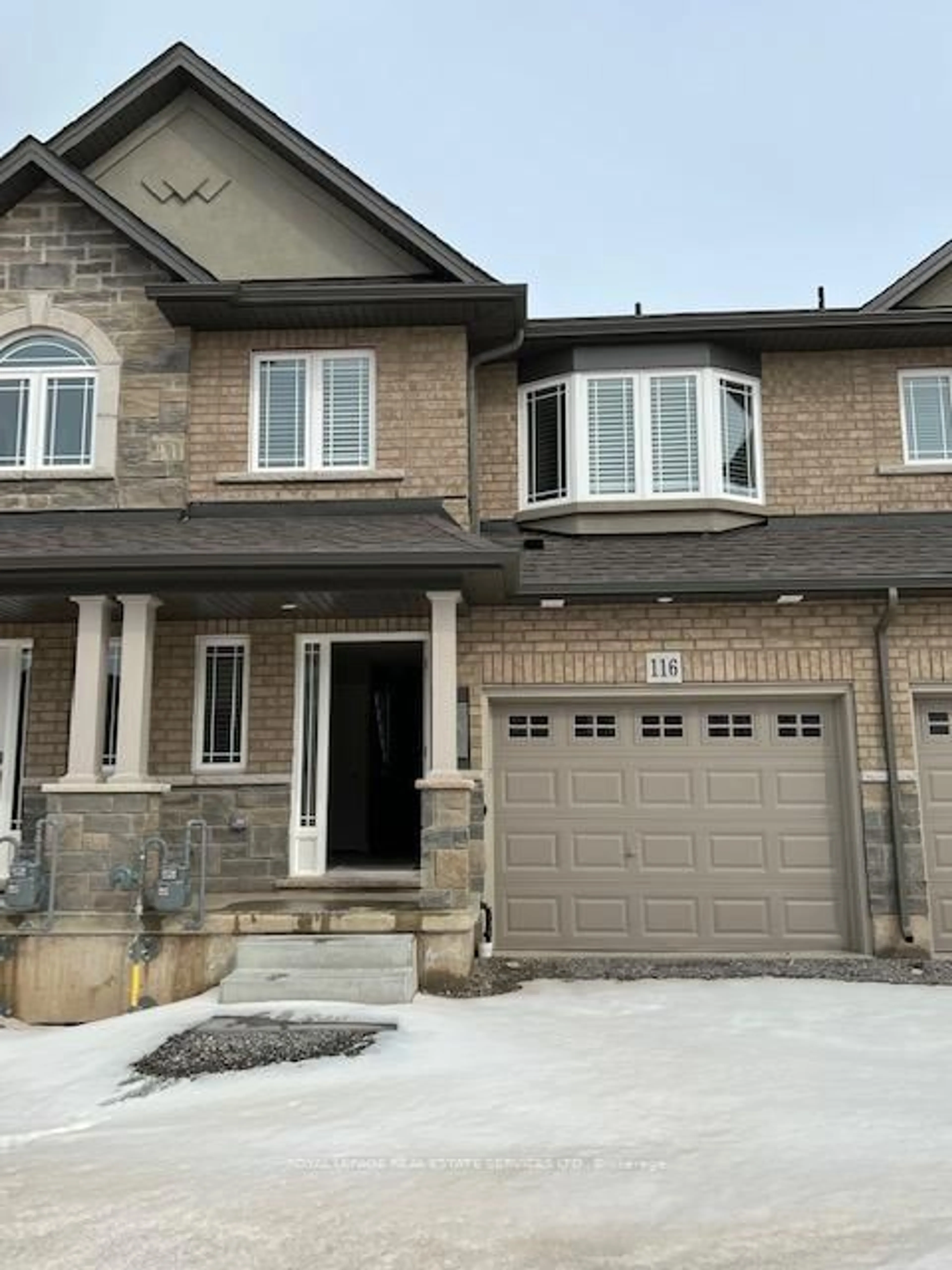 Home with brick exterior material, street for 116 Laguna Village Cres, Hamilton Ontario L0R 1P0