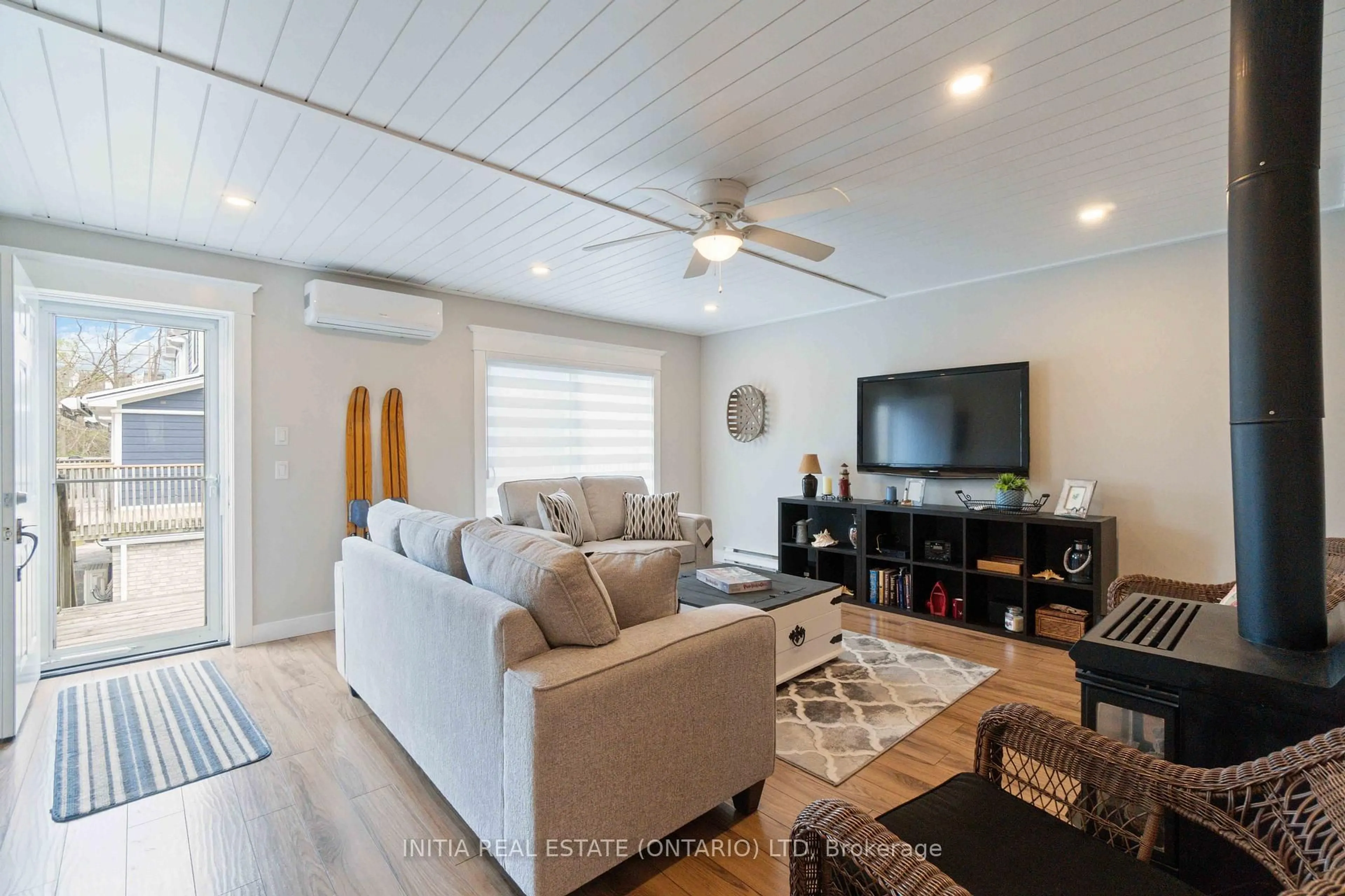 Living room with furniture, wood/laminate floor for 5 River Rd #11, Lambton Shores Ontario N0M 1T0