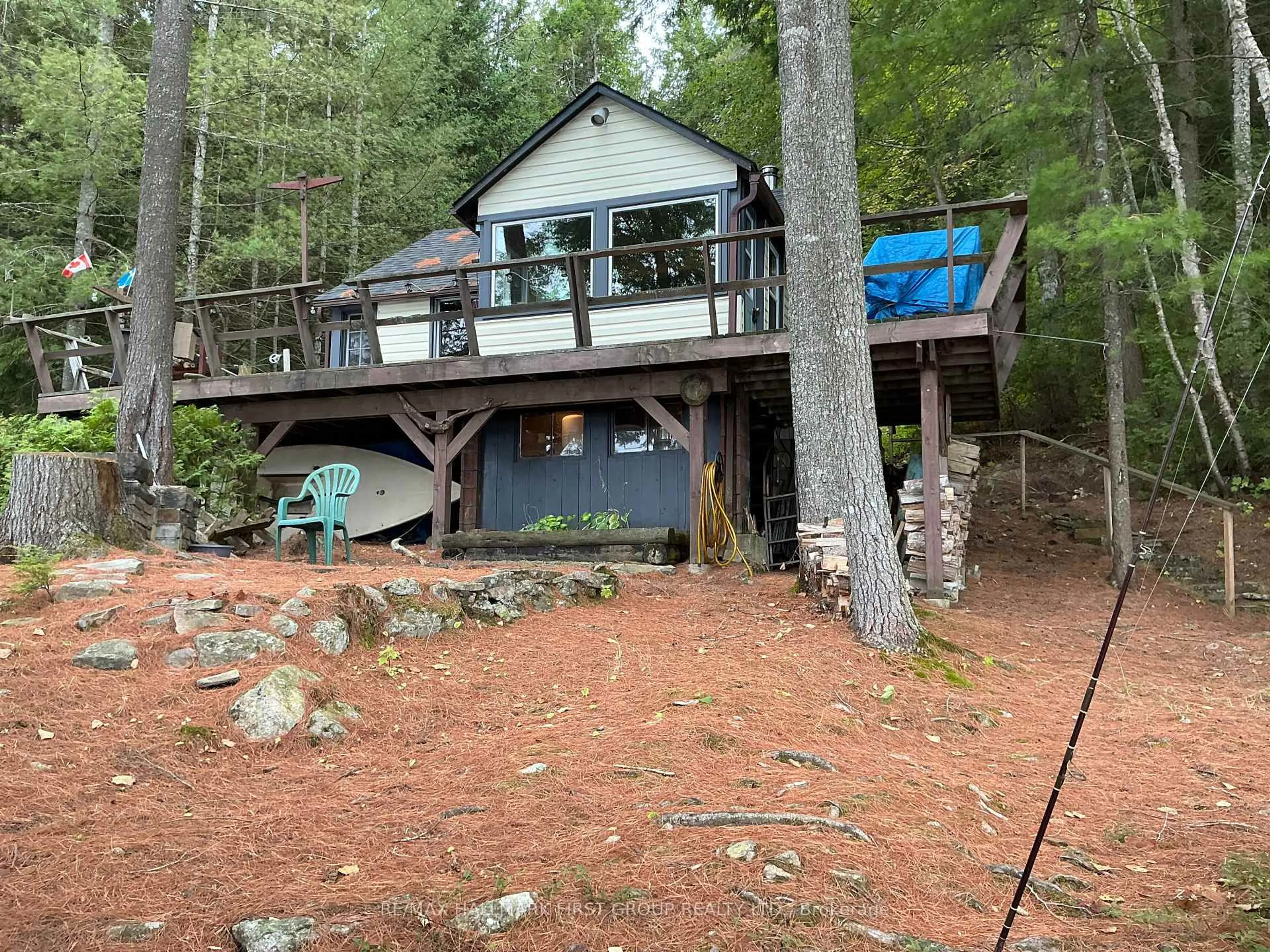 A pic from outside/outdoor area/front of a property/back of a property/a pic from drone, water/lake/river/ocean view for 10209 Little Hawk-West Shore, Algonquin Highlands Ontario K0M 1J1