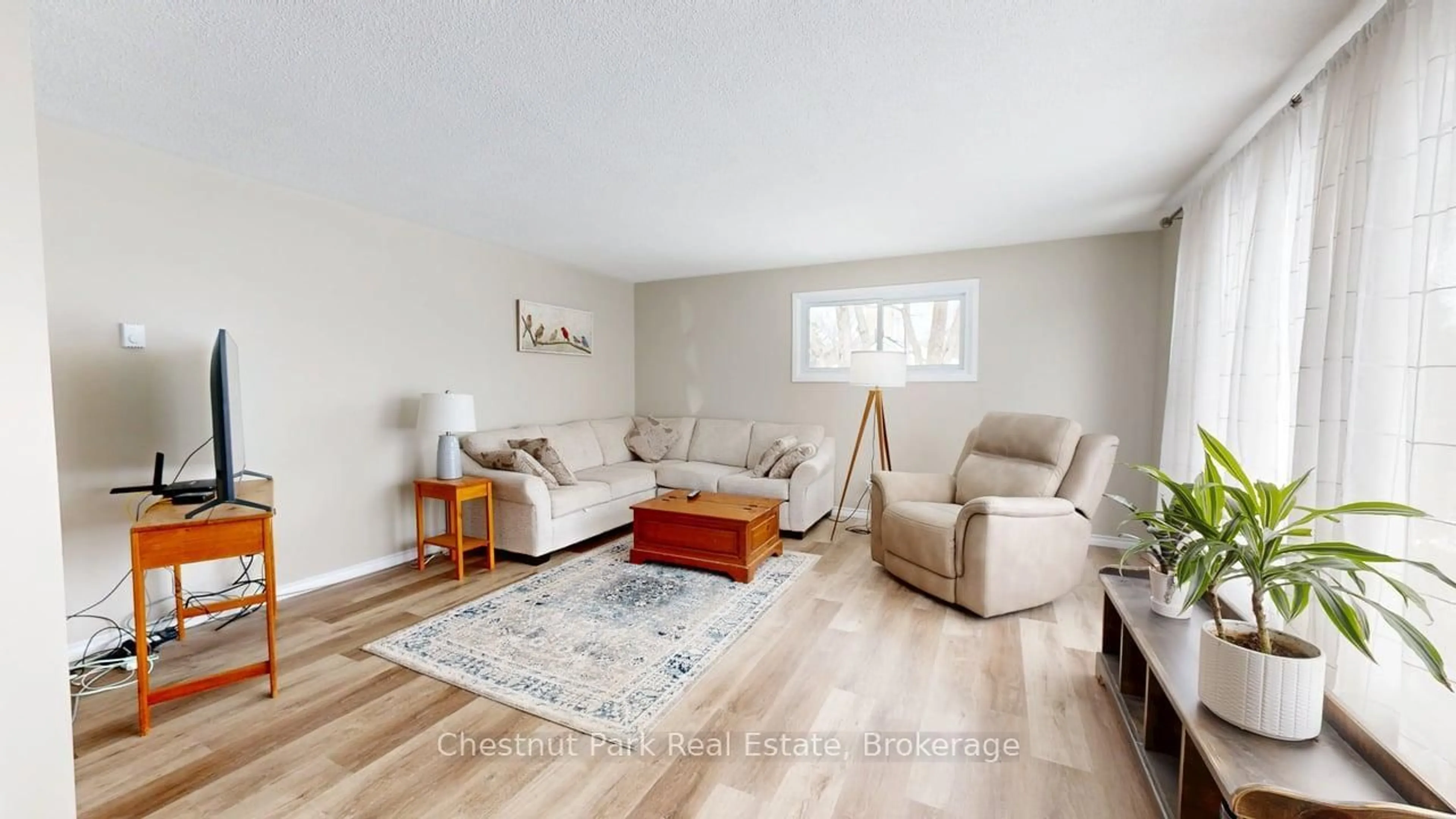 Living room with furniture, wood/laminate floor for 381 HIGH St, Georgian Bay Ontario P0C 1H0