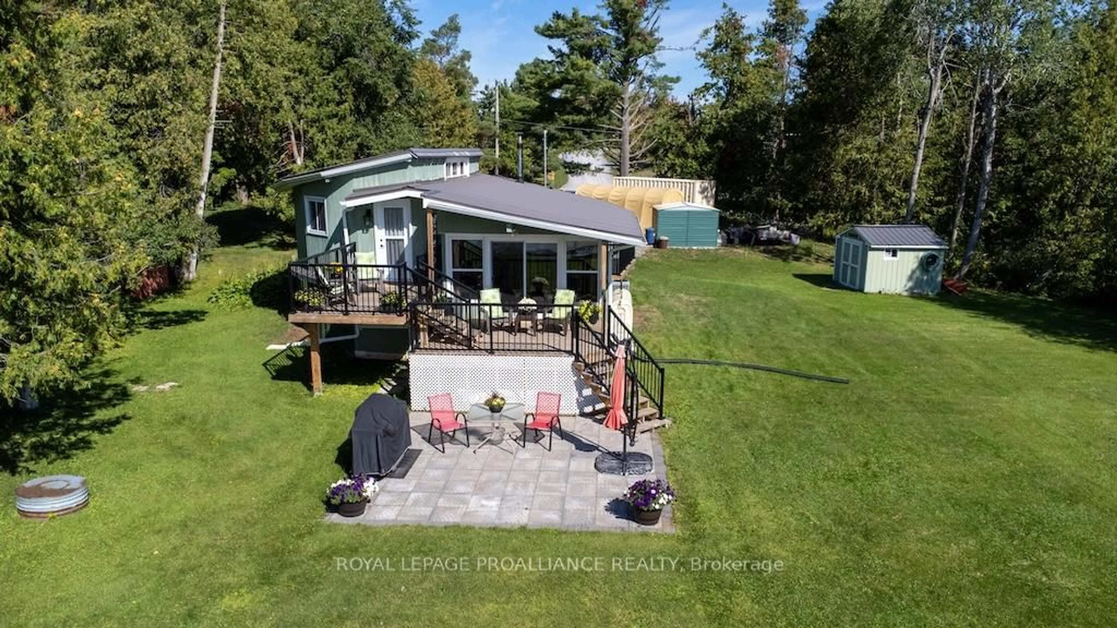 A pic from outside/outdoor area/front of a property/back of a property/a pic from drone, water/lake/river/ocean view for 193 Fife's Bay Rd, Selwyn Ontario K9J 0C5
