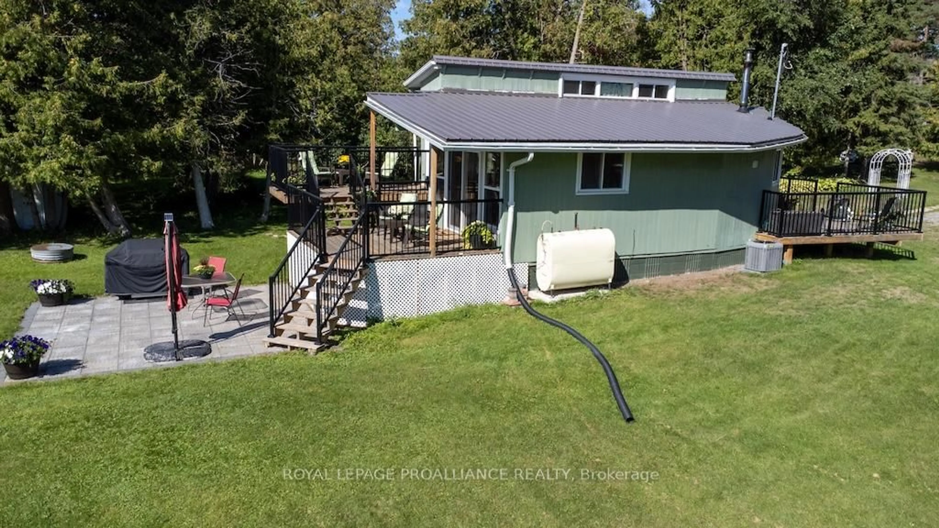 A pic from outside/outdoor area/front of a property/back of a property/a pic from drone, water/lake/river/ocean view for 193 Fife's Bay Rd, Selwyn Ontario K9J 0C5