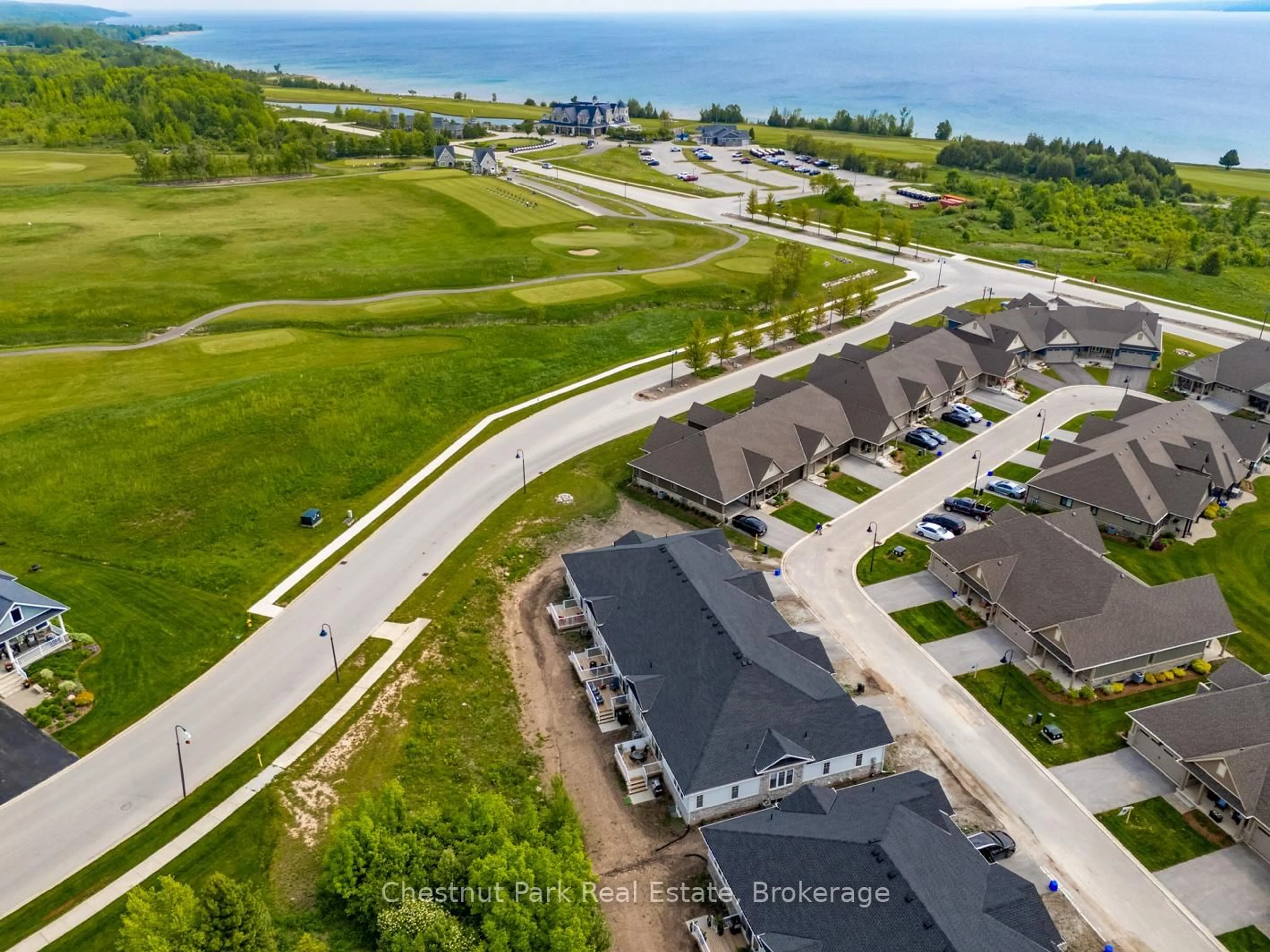 A pic from outside/outdoor area/front of a property/back of a property/a pic from drone, water/lake/river/ocean view for 161 Hawthorn Cres, Georgian Bluffs Ontario N0H 1S0