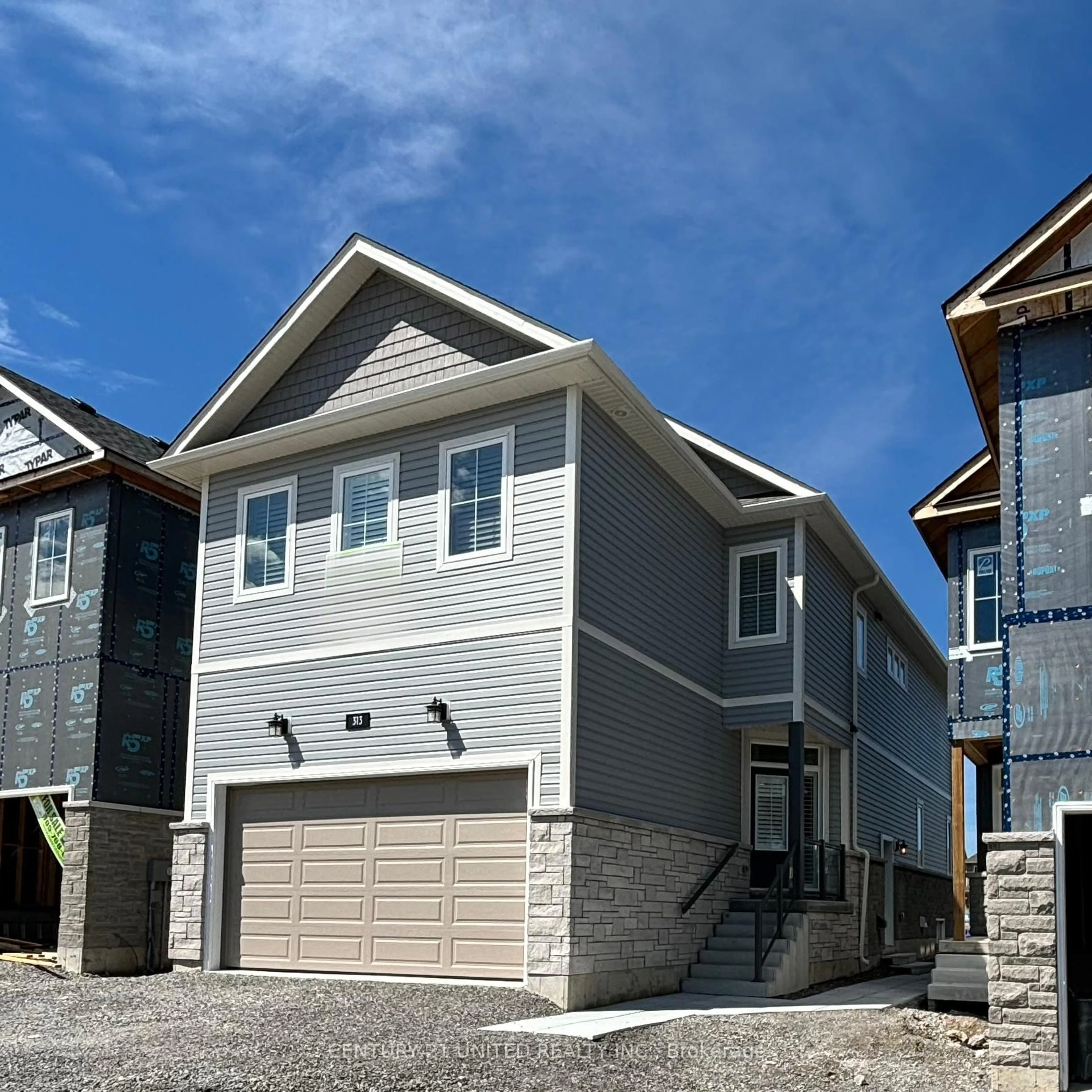 Home with vinyl exterior material, street for 313 Mullighan Gdns, Peterborough North Ontario K9K 0G3
