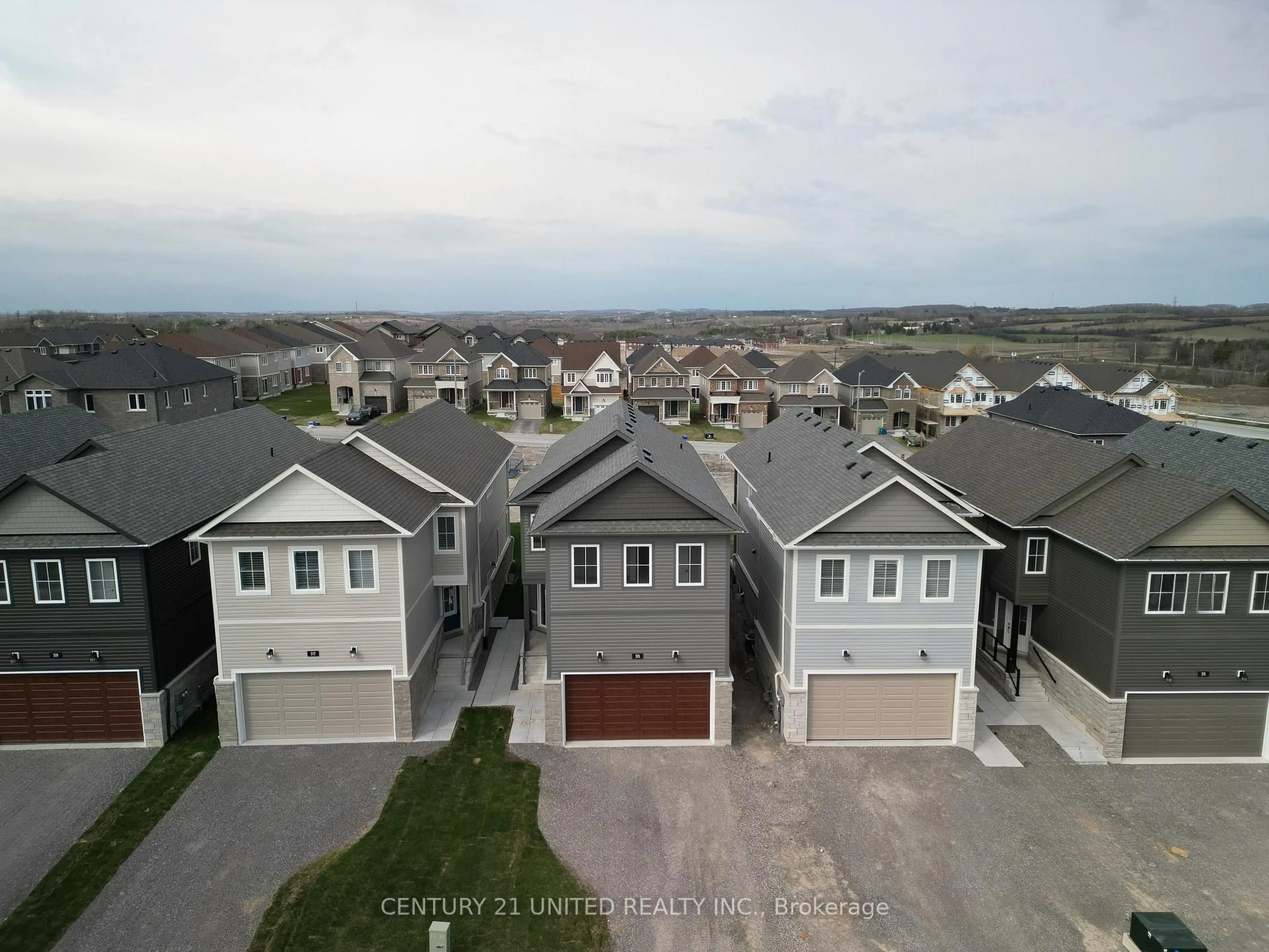 A pic from outside/outdoor area/front of a property/back of a property/a pic from drone, street for 315 Mullighan Gdns, Peterborough North Ontario K9K 0H2