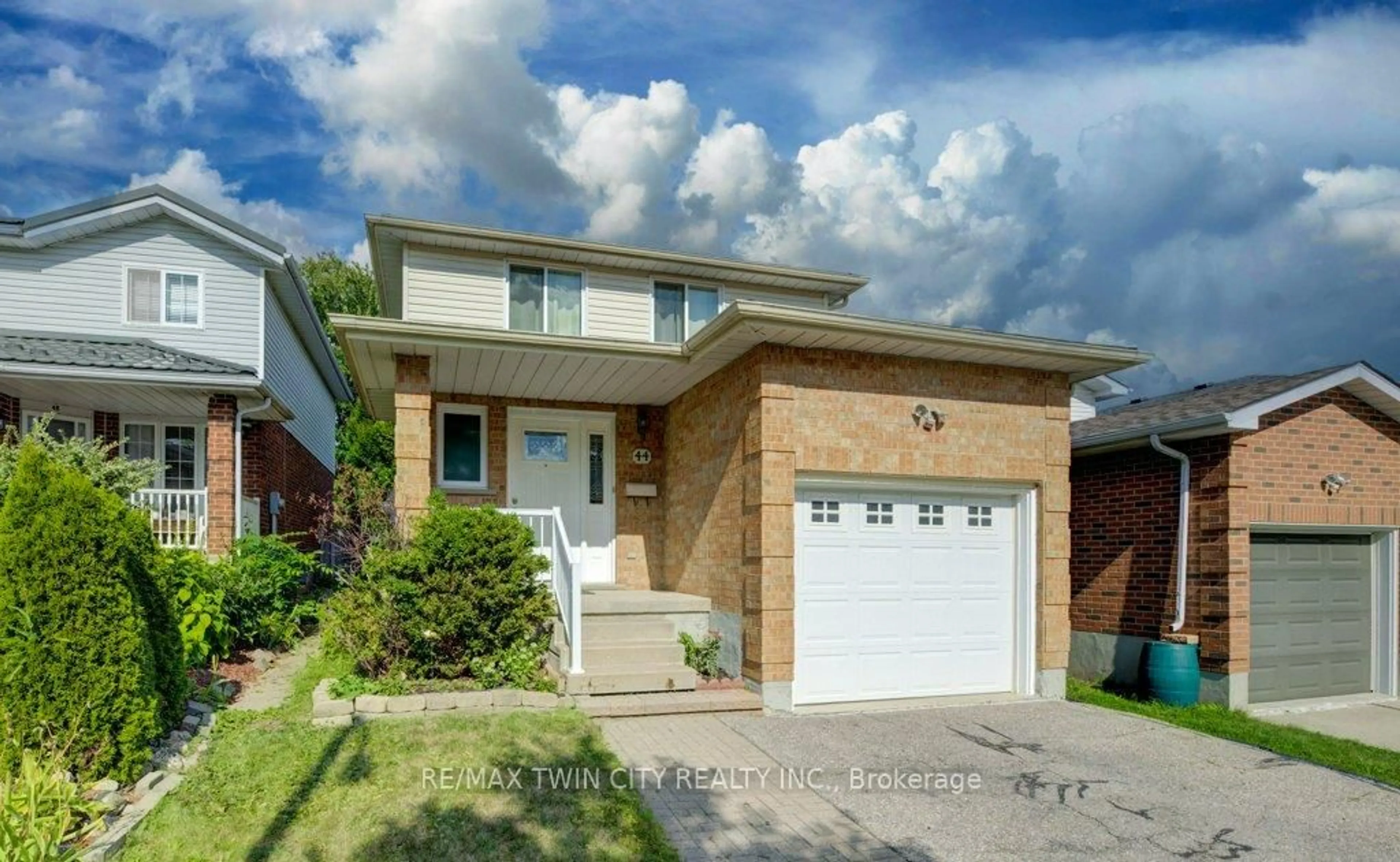 Home with brick exterior material, street for 44 Northmanor Cres, Kitchener Ontario N2N 3C2