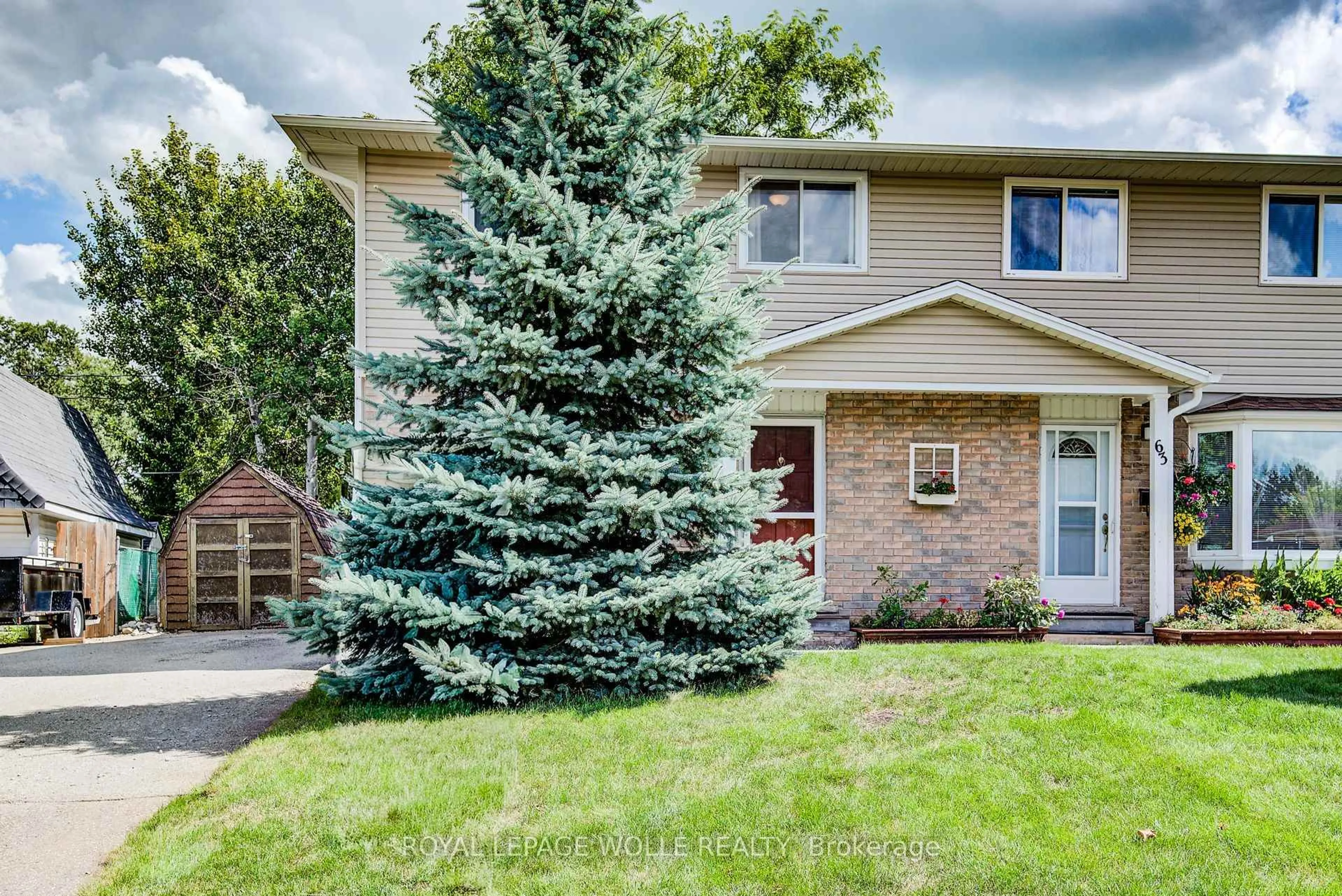Home with vinyl exterior material, street for 65 Aspen Cres, Woolwich Ontario N3B 1J7