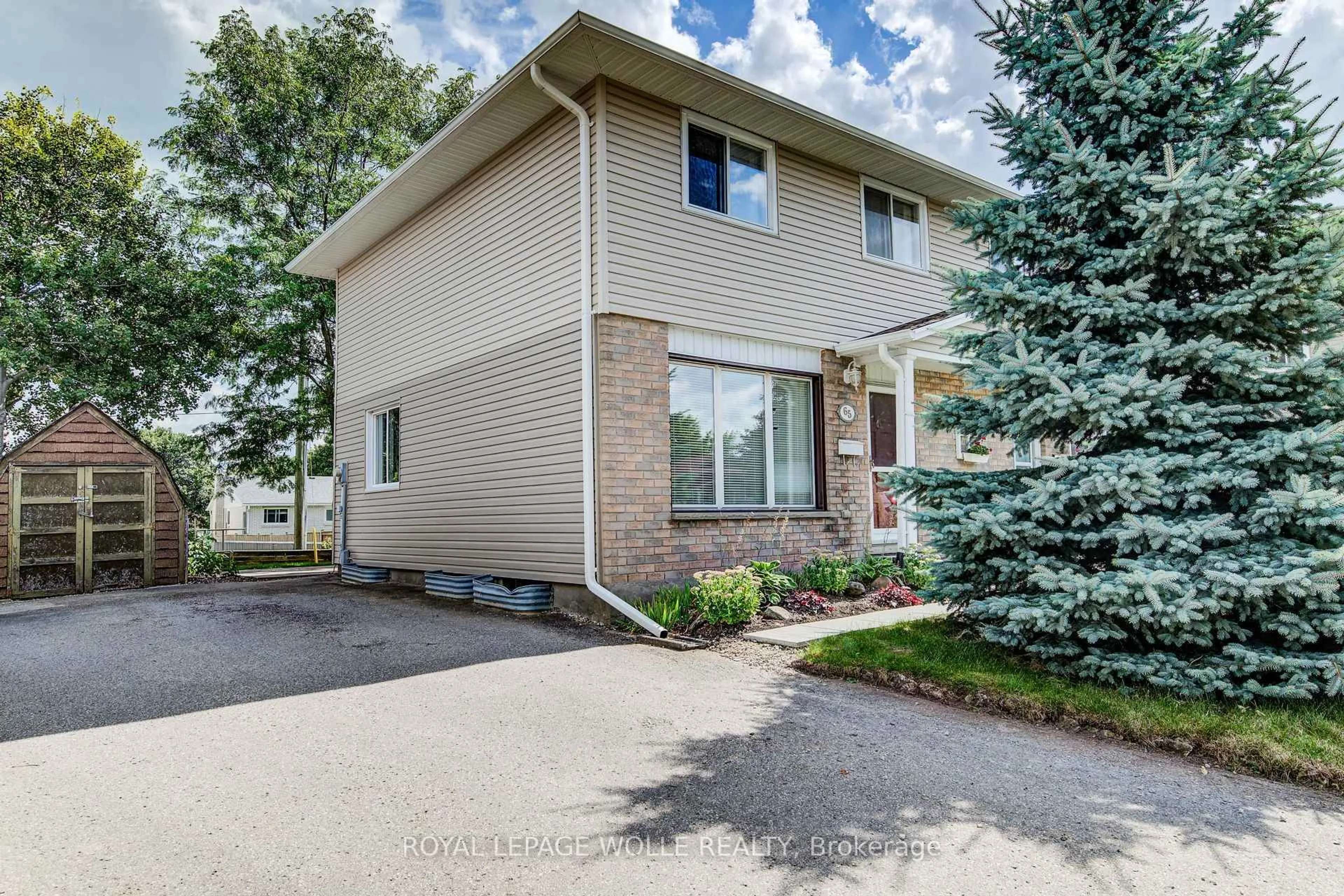 Home with brick exterior material, street for 65 Aspen Cres, Woolwich Ontario N3B 1J7