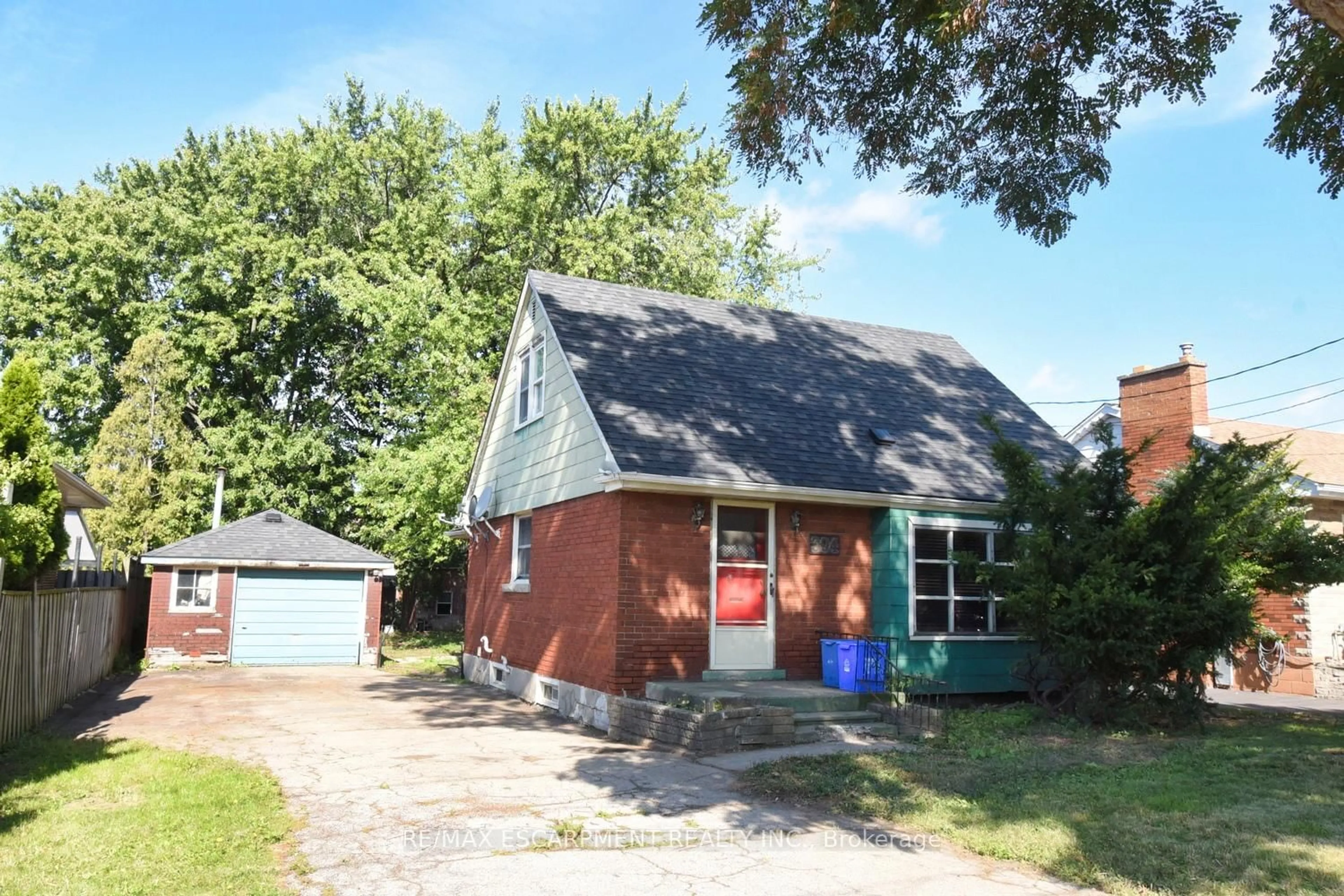 Home with brick exterior material, street for 394 Upper Ottawa St, Hamilton Ontario L8T 3T1