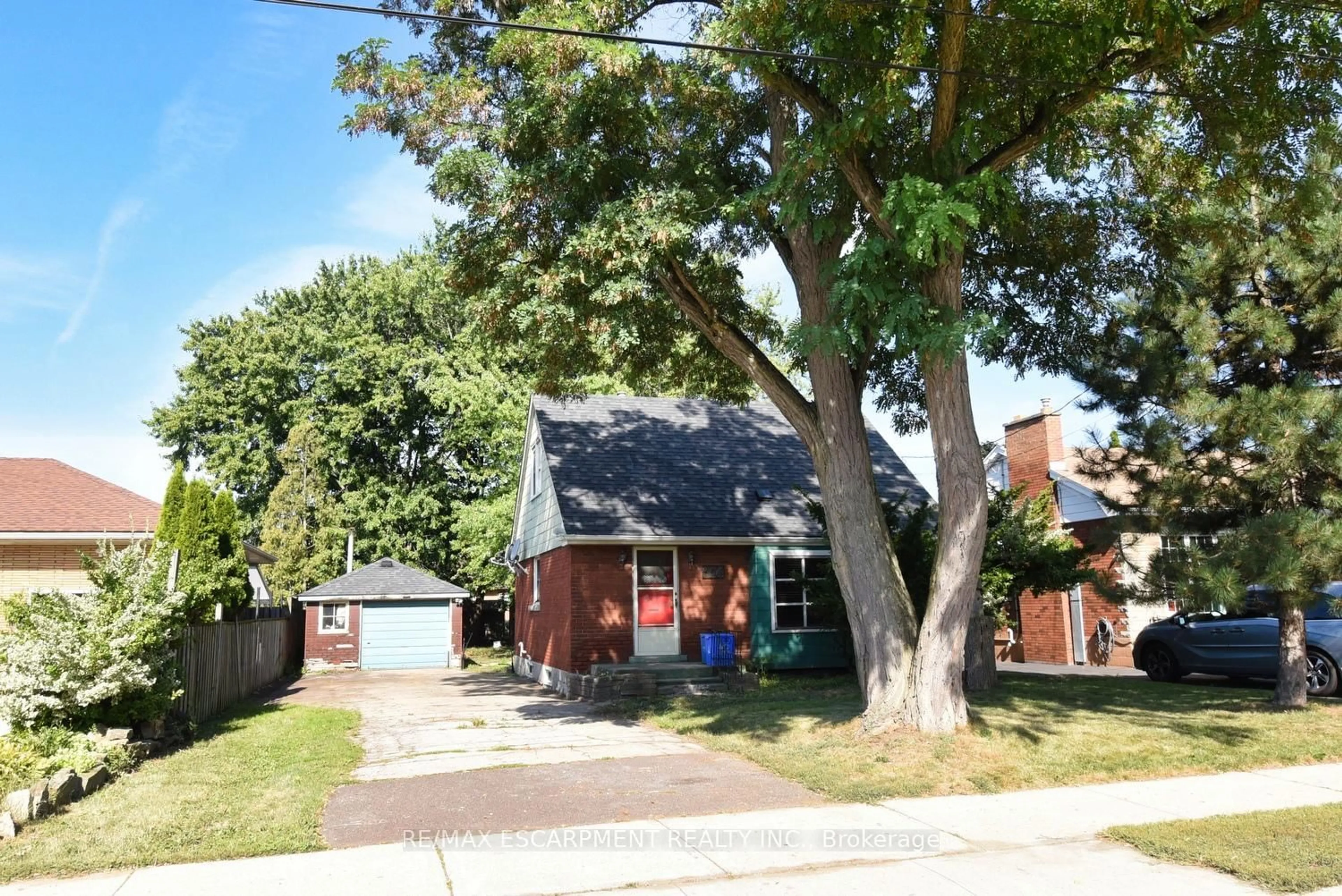 Home with brick exterior material, street for 394 Upper Ottawa St, Hamilton Ontario L8T 3T1