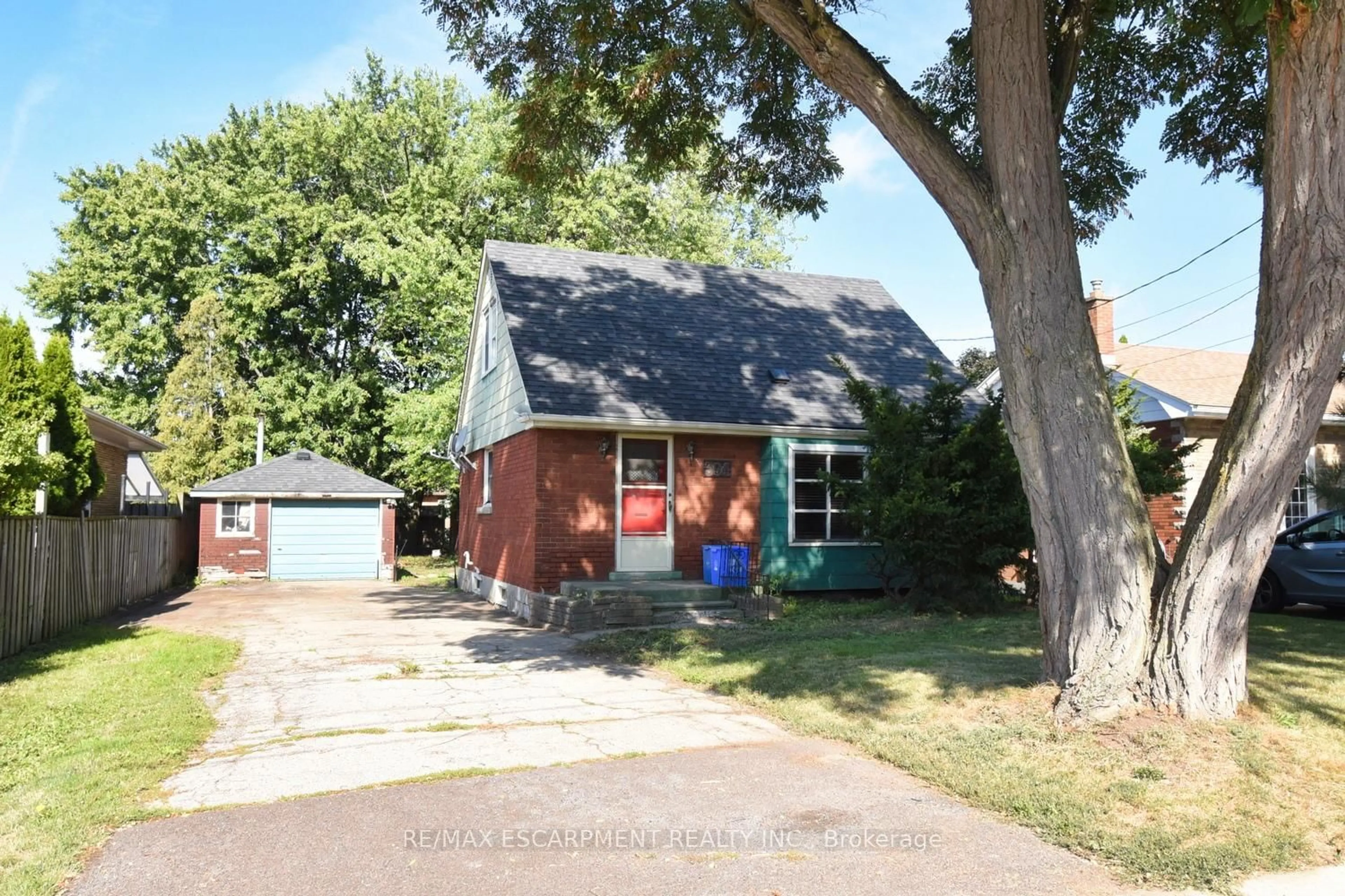 Home with brick exterior material, street for 394 Upper Ottawa St, Hamilton Ontario L8T 3T1
