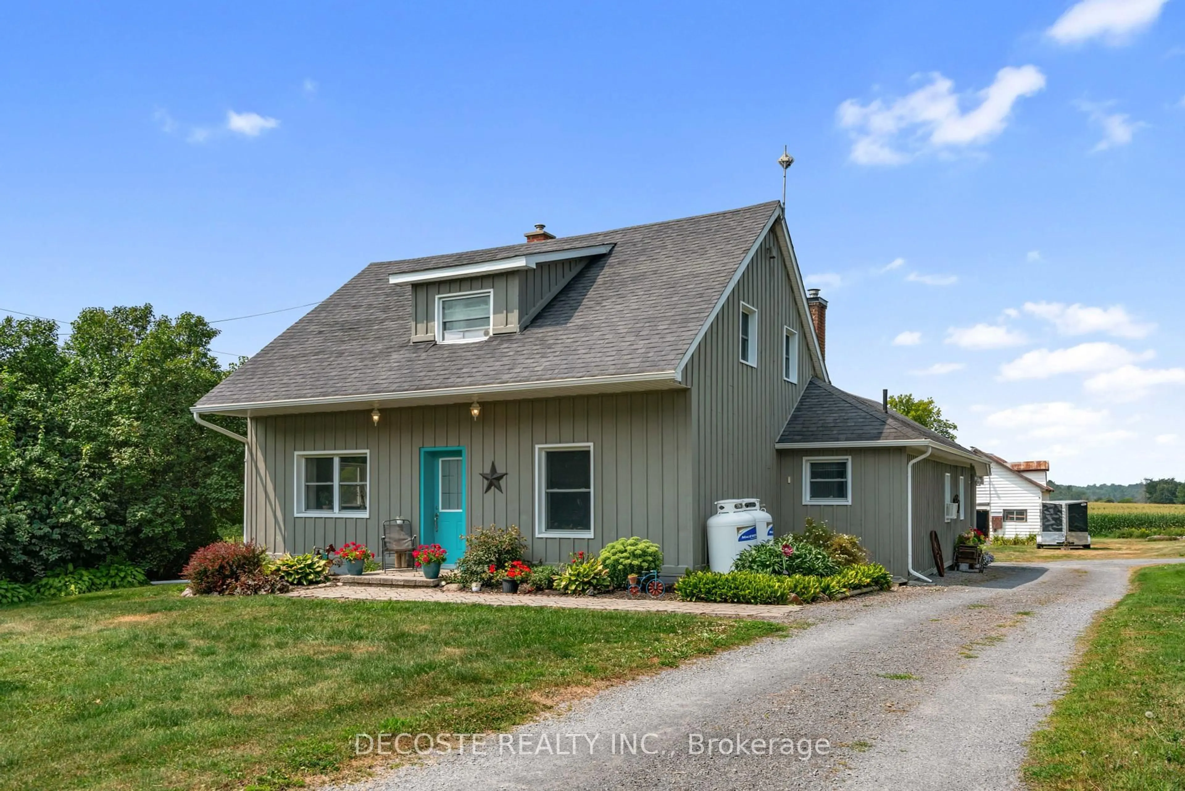 Home with vinyl exterior material, street for 21695 Laggan-Glenelg Rd, North Glengarry Ontario K0B 1E0