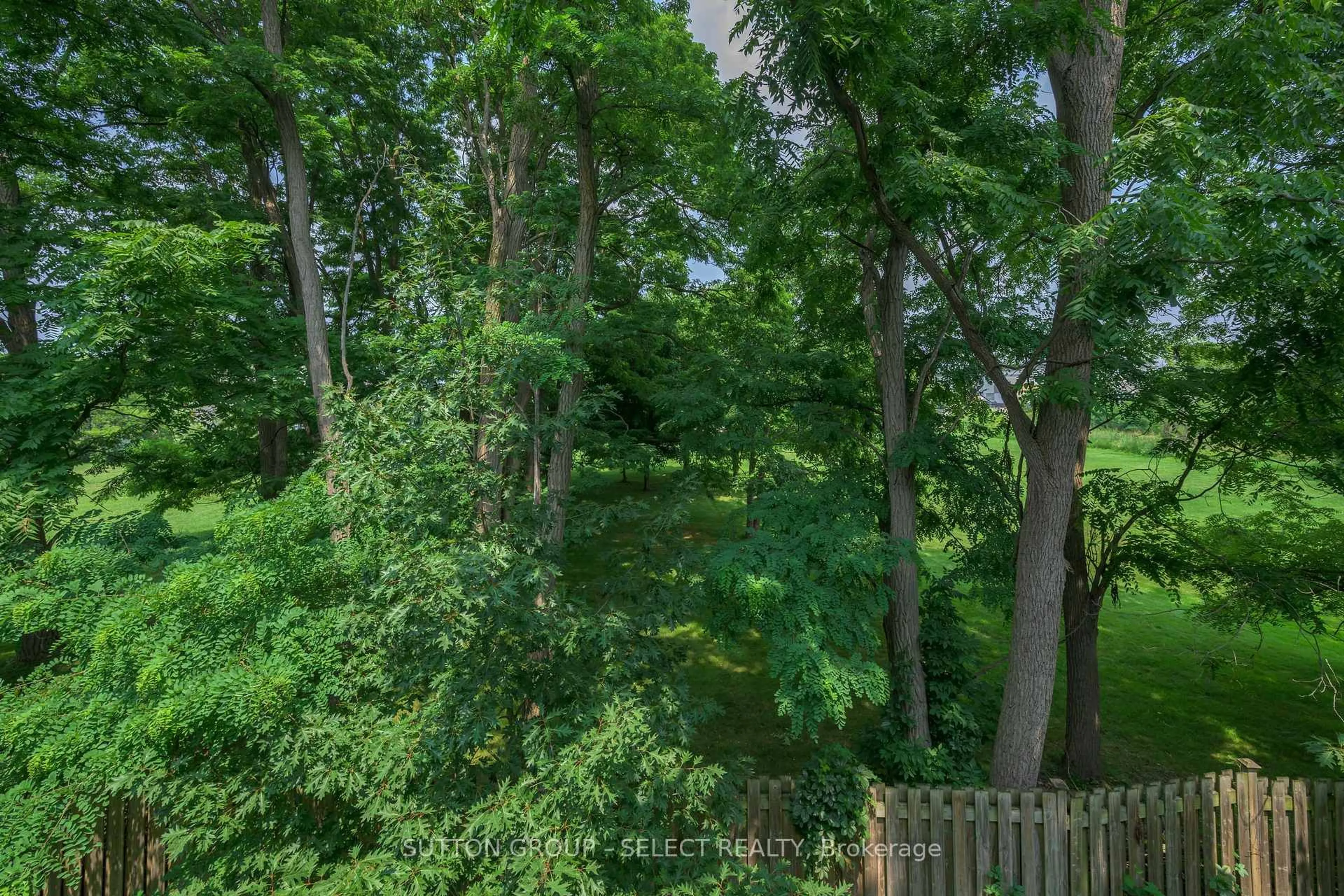 A pic from outside/outdoor area/front of a property/back of a property/a pic from drone, forest/trees view for 1040 Coronation Dr #43, London North Ontario N6G 0R8