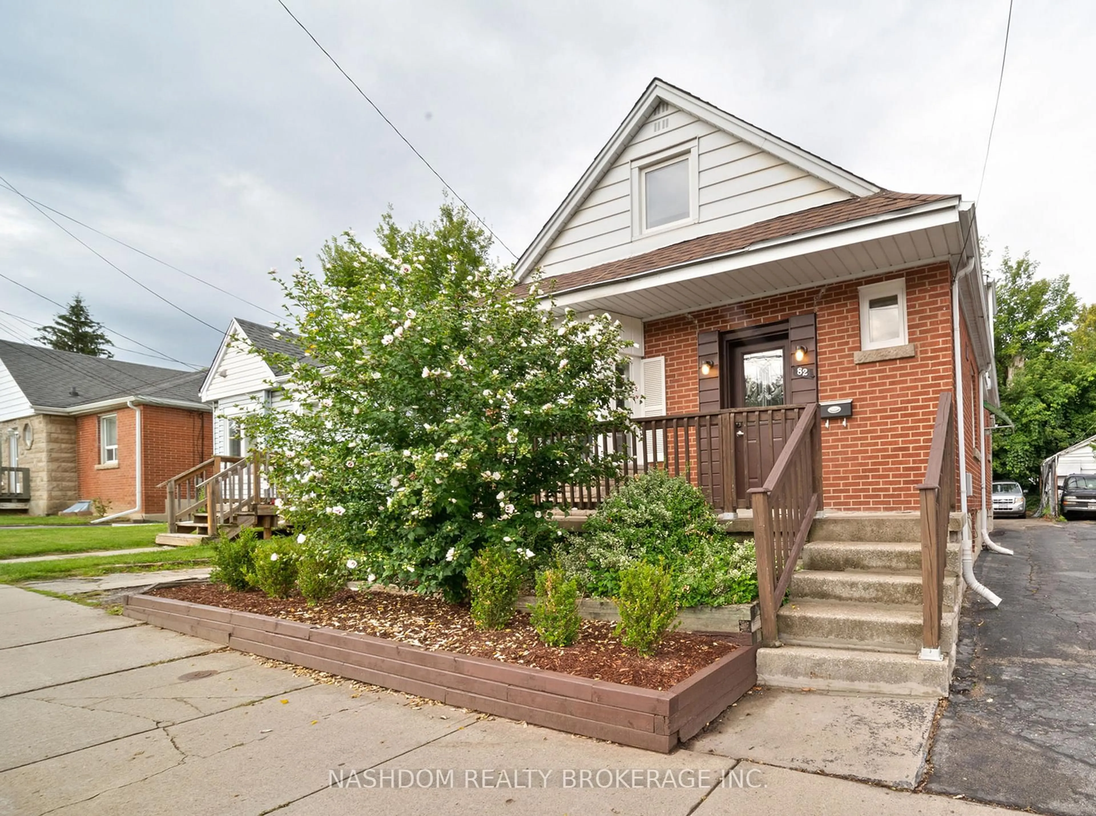 Home with brick exterior material, street for 82 Whitney Ave, Hamilton Ontario L8S 2G5