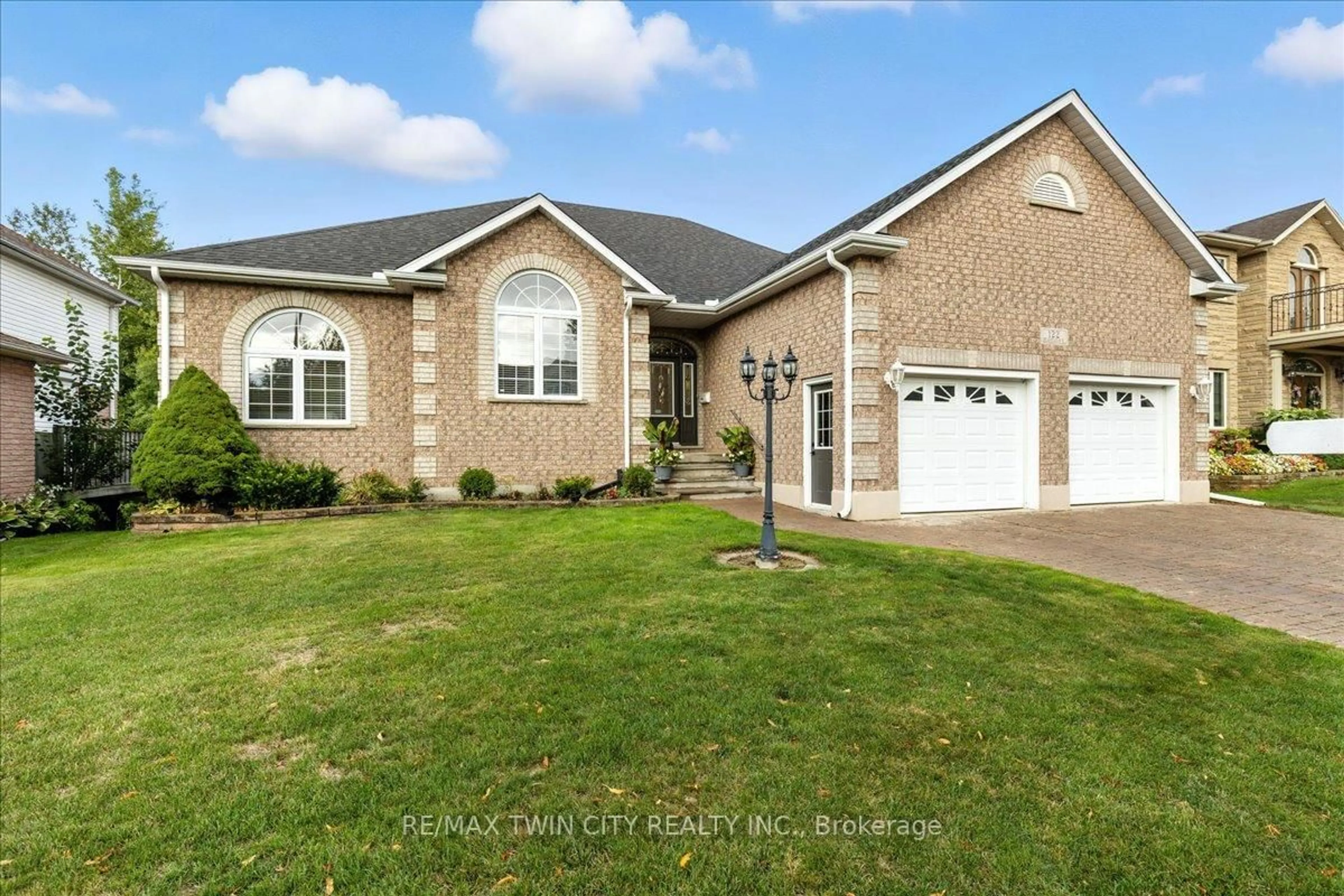 Home with brick exterior material, street for 122 Briarmeadow Pl, Kitchener Ontario N2A 4C6