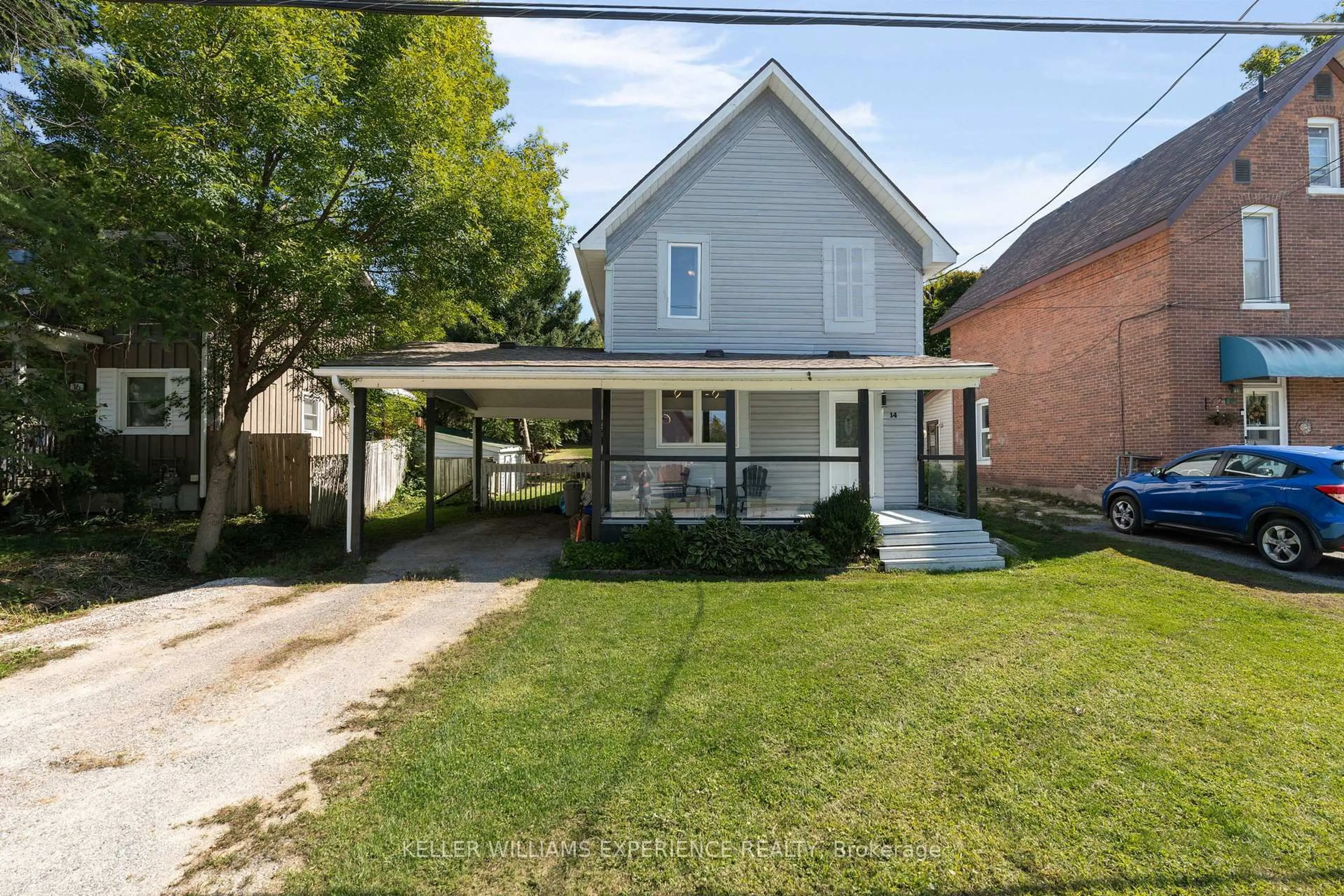 A pic from outside/outdoor area/front of a property/back of a property/a pic from drone, street for 14 North Fetterly St, Huntsville Ontario P1H 1K8