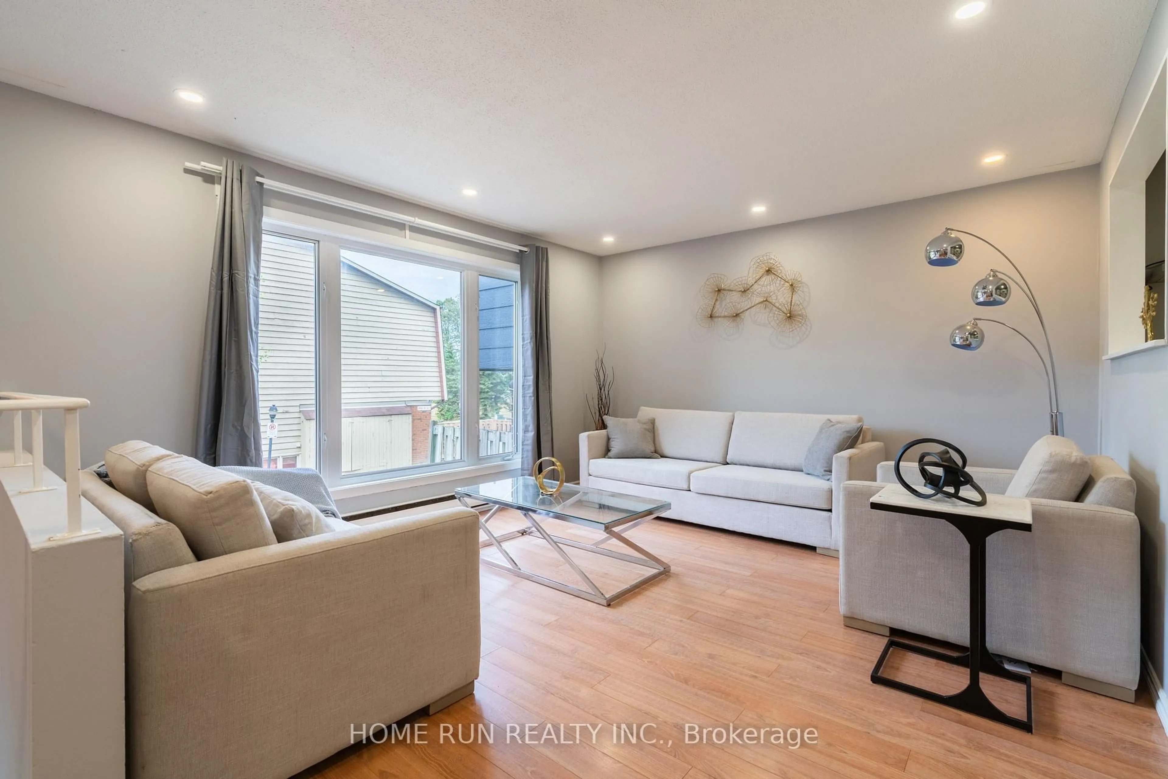 Living room with furniture, wood/laminate floor for 2610 Draper Ave #22, Ottawa Ontario K2H 8X8